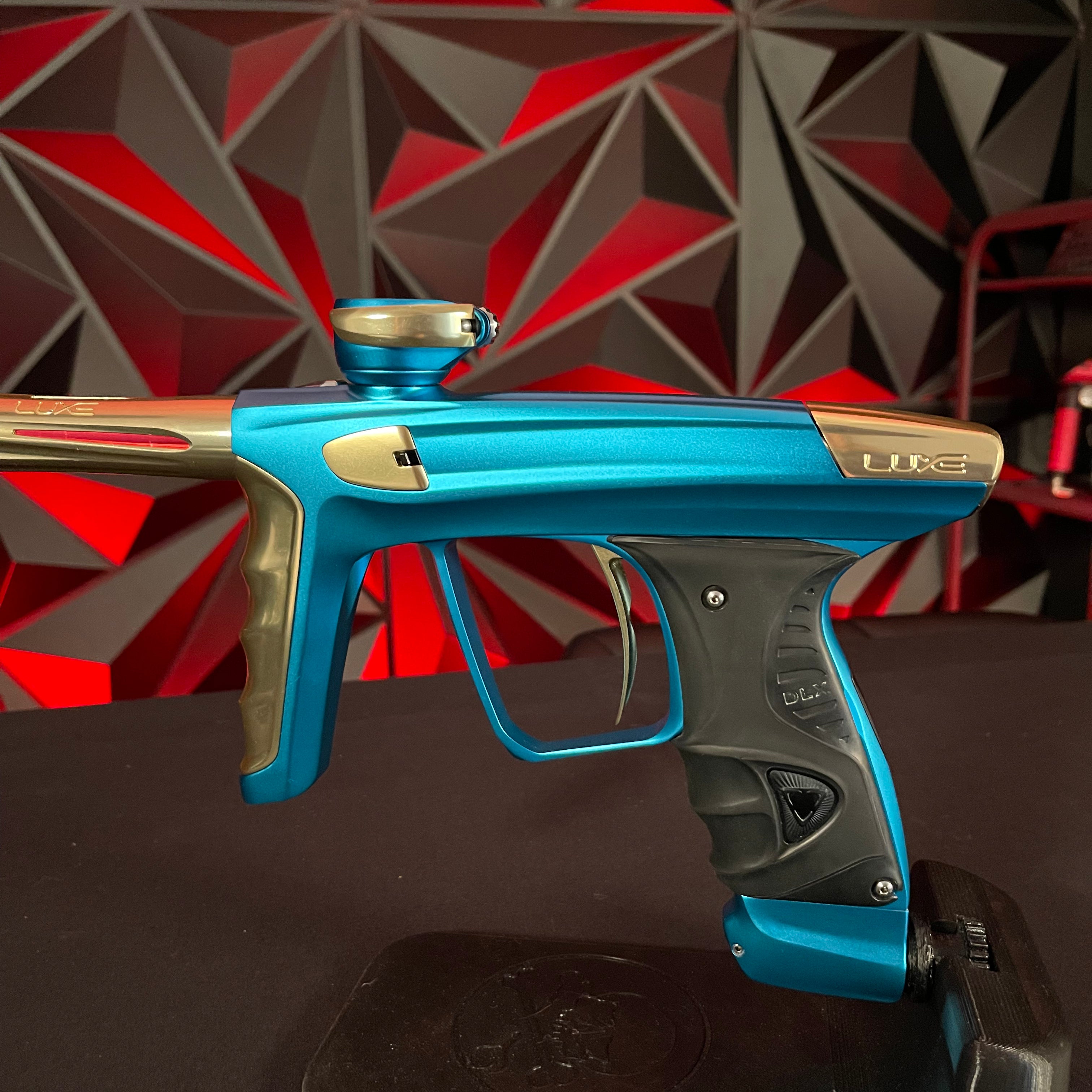 Used DLX Luxe X Paintball Gun - Dust Teal / Polished Gold