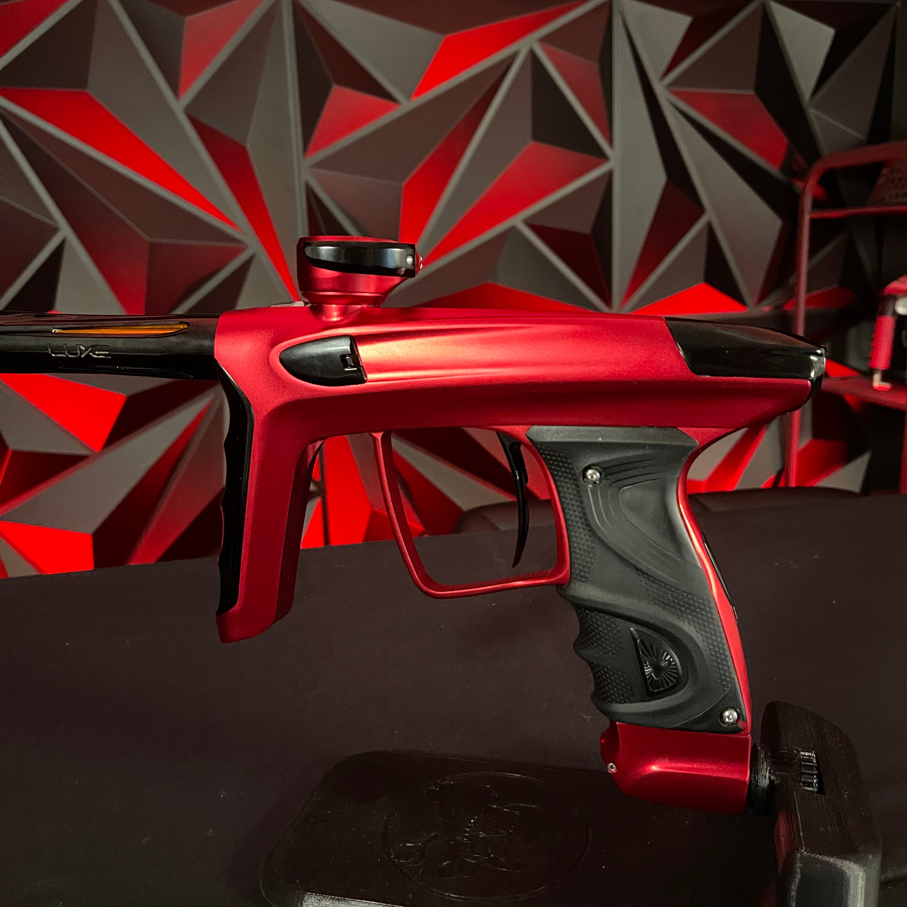 Used DLX Luxe TM40 Paintball Gun- Dust Red/Polished Black