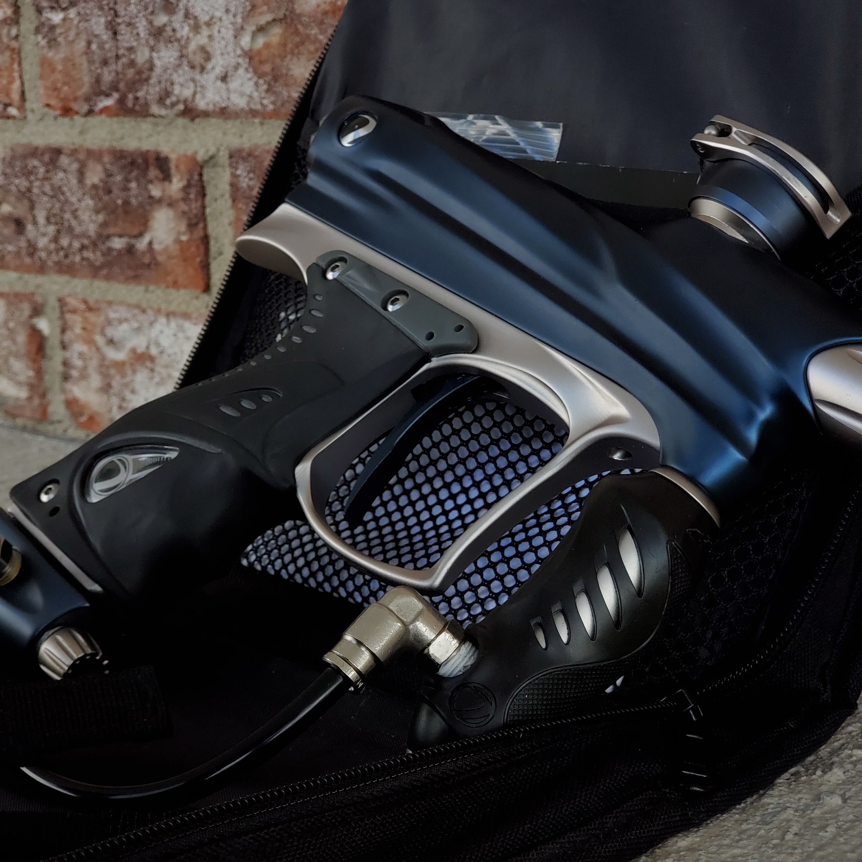 Used Dye DM9 Paintball Marker - Blue / Silver