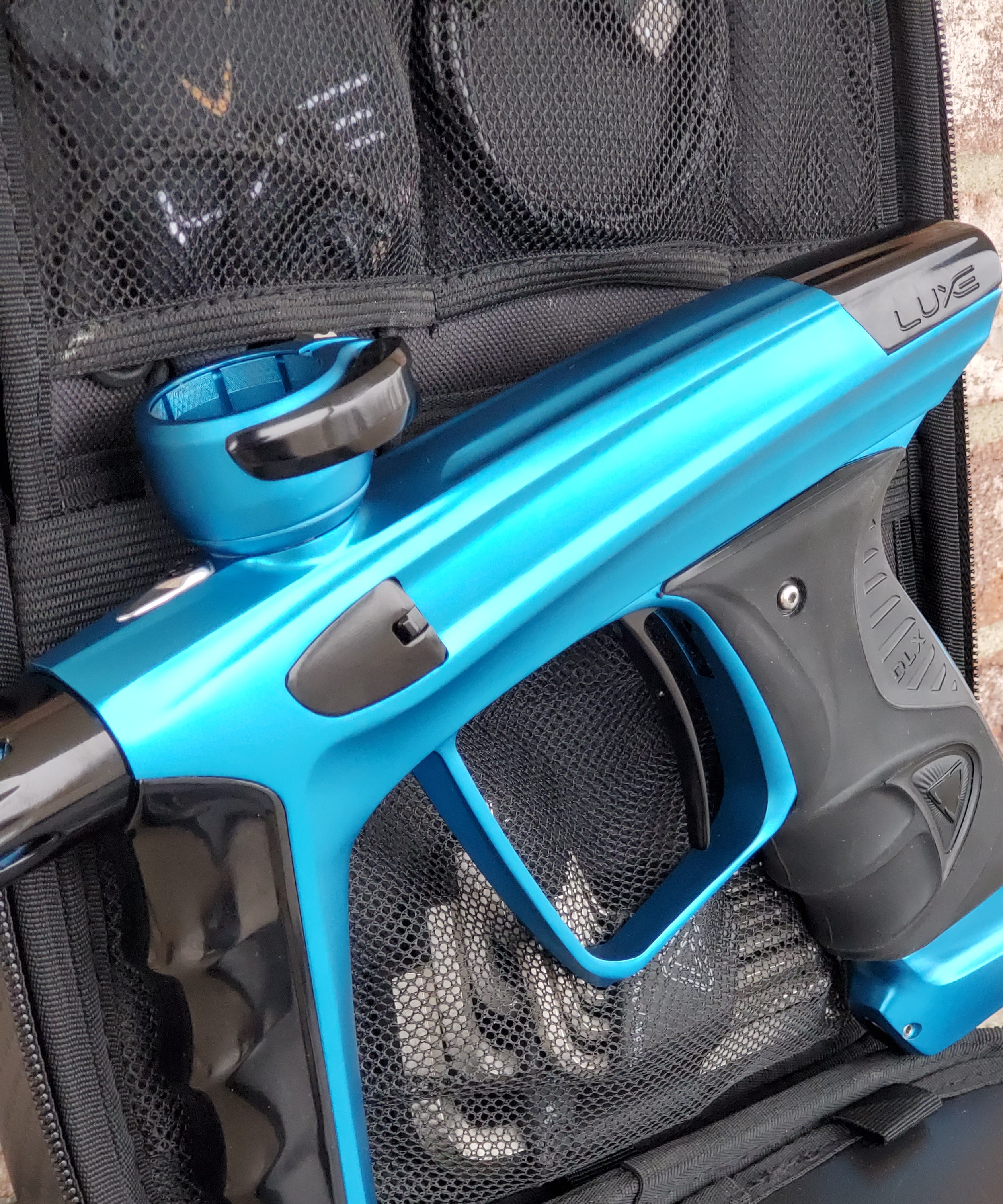 Used DLX Luxe X Paintball Gun - Teal / Black