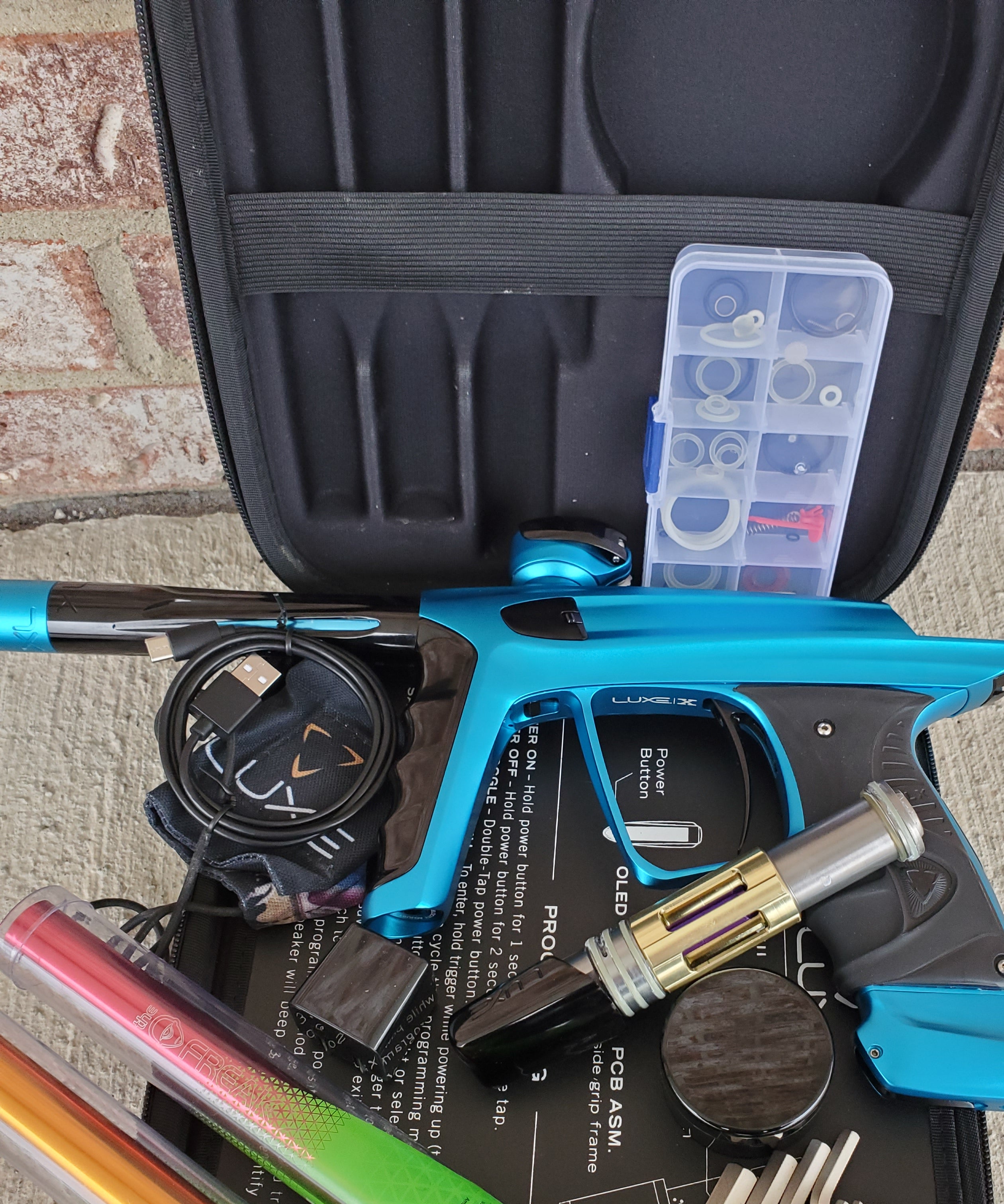Used DLX Luxe X Paintball Gun - Teal / Black