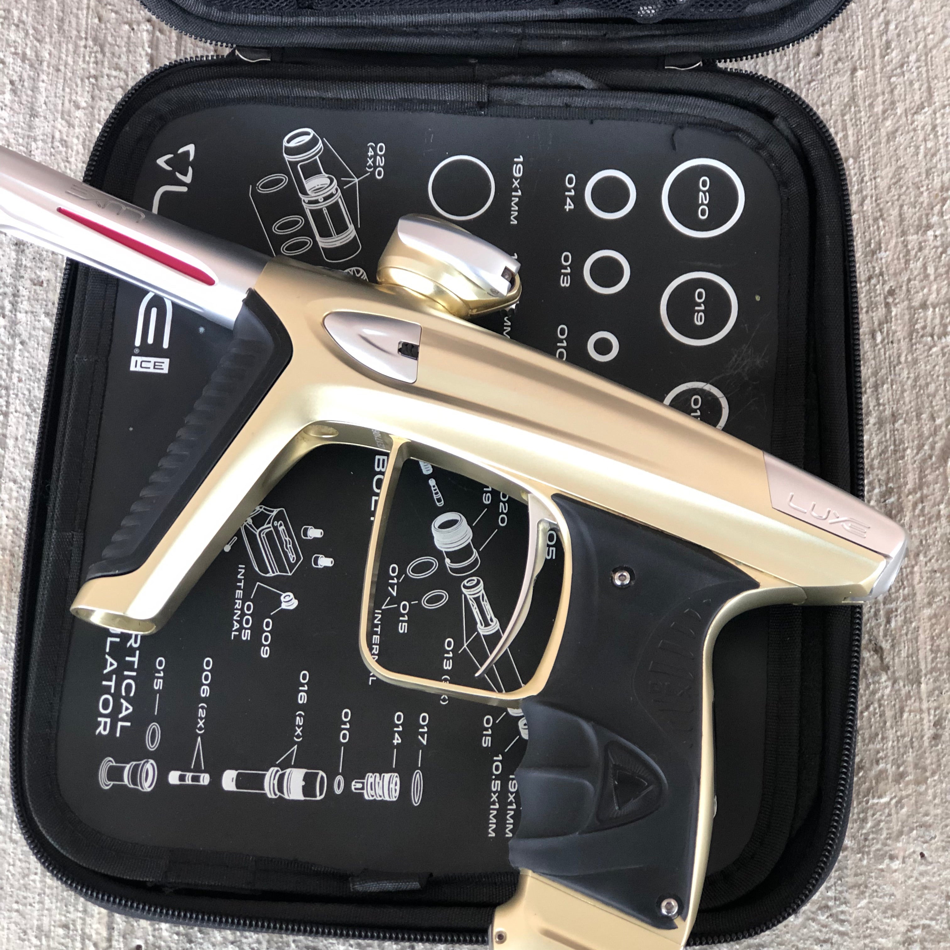 Used DLX Luxe Ice Paintball Gun - Dust Gold/Silver