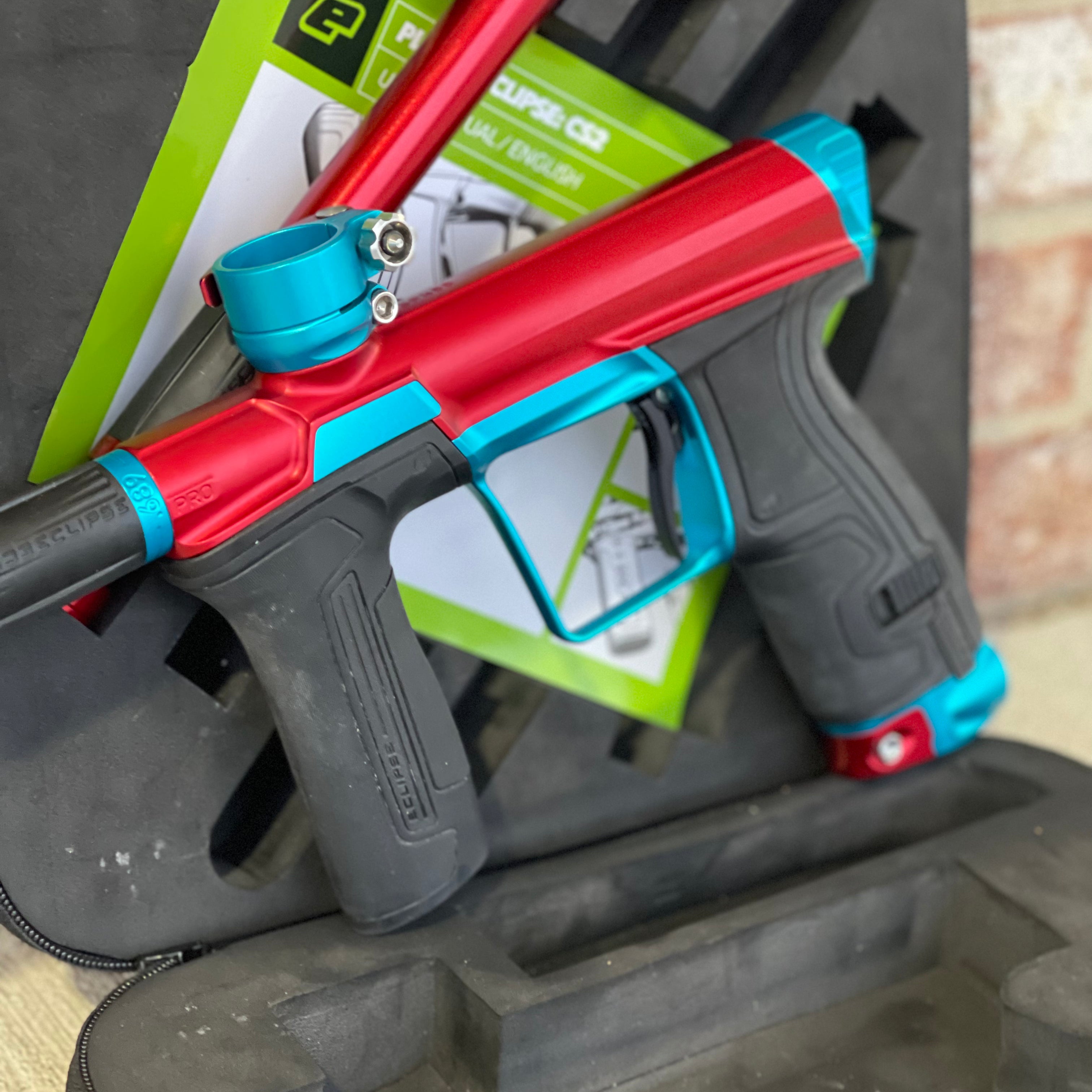 Used Planet Eclipse CS2 Pro Paintball Gun - Red/Teal