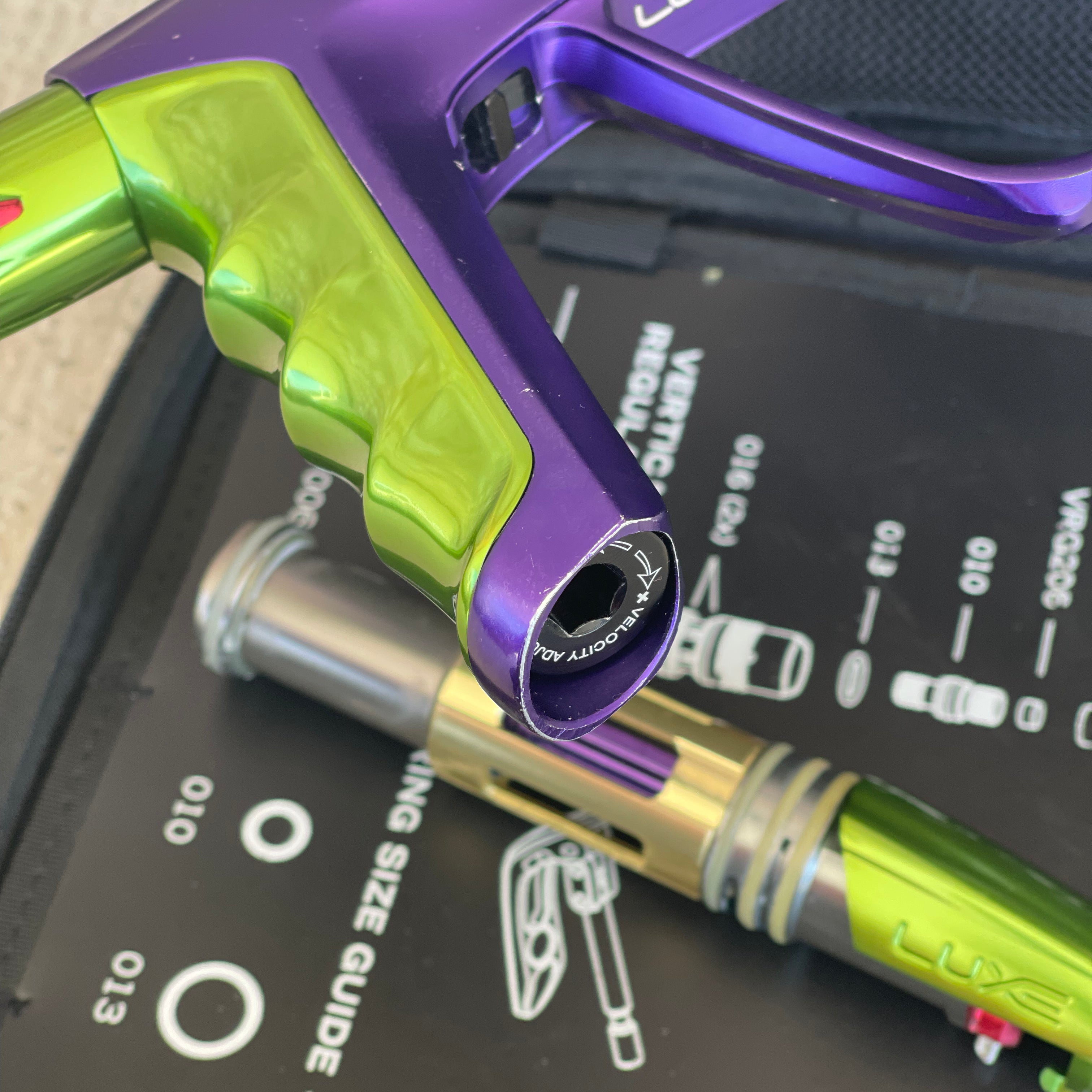 Used DLX Luxe X Paintball Gun - Dust Purple / Polished Green