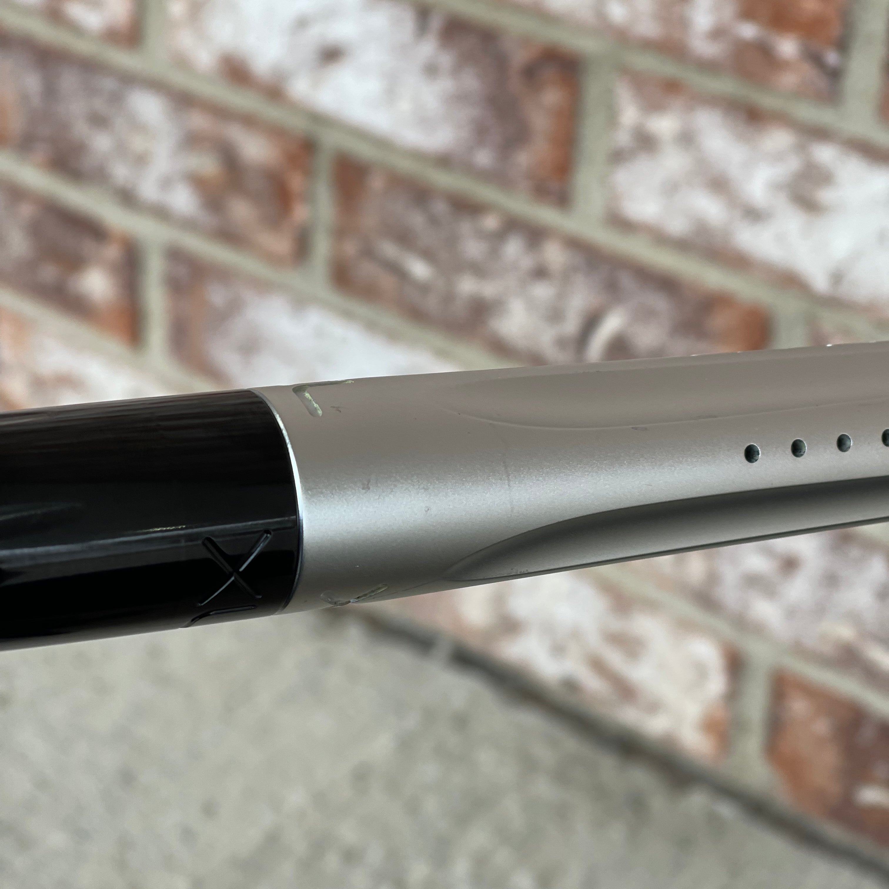 Used DLX Luxe TM40 Paintball Gun - Dust Silver/Gloss Black w/ Stock Bolt and SSC Bolt