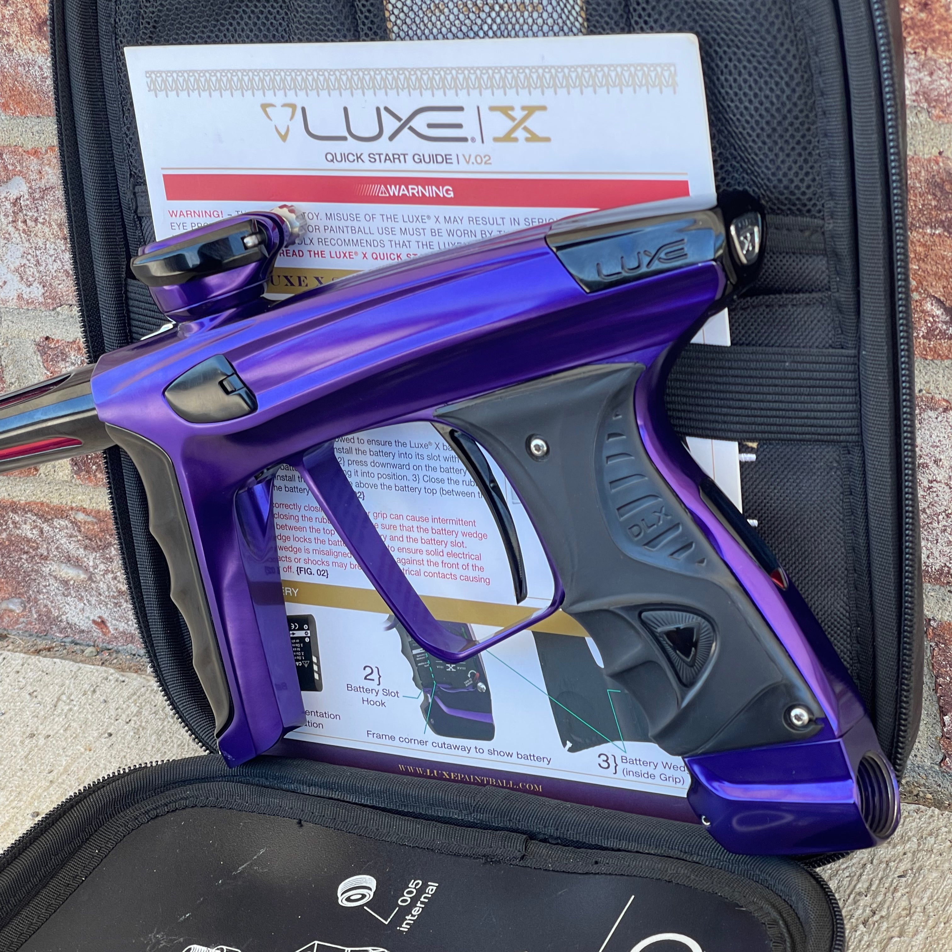 Used DLX Luxe X Paintball Gun - Gloss Purple / Gloss Black