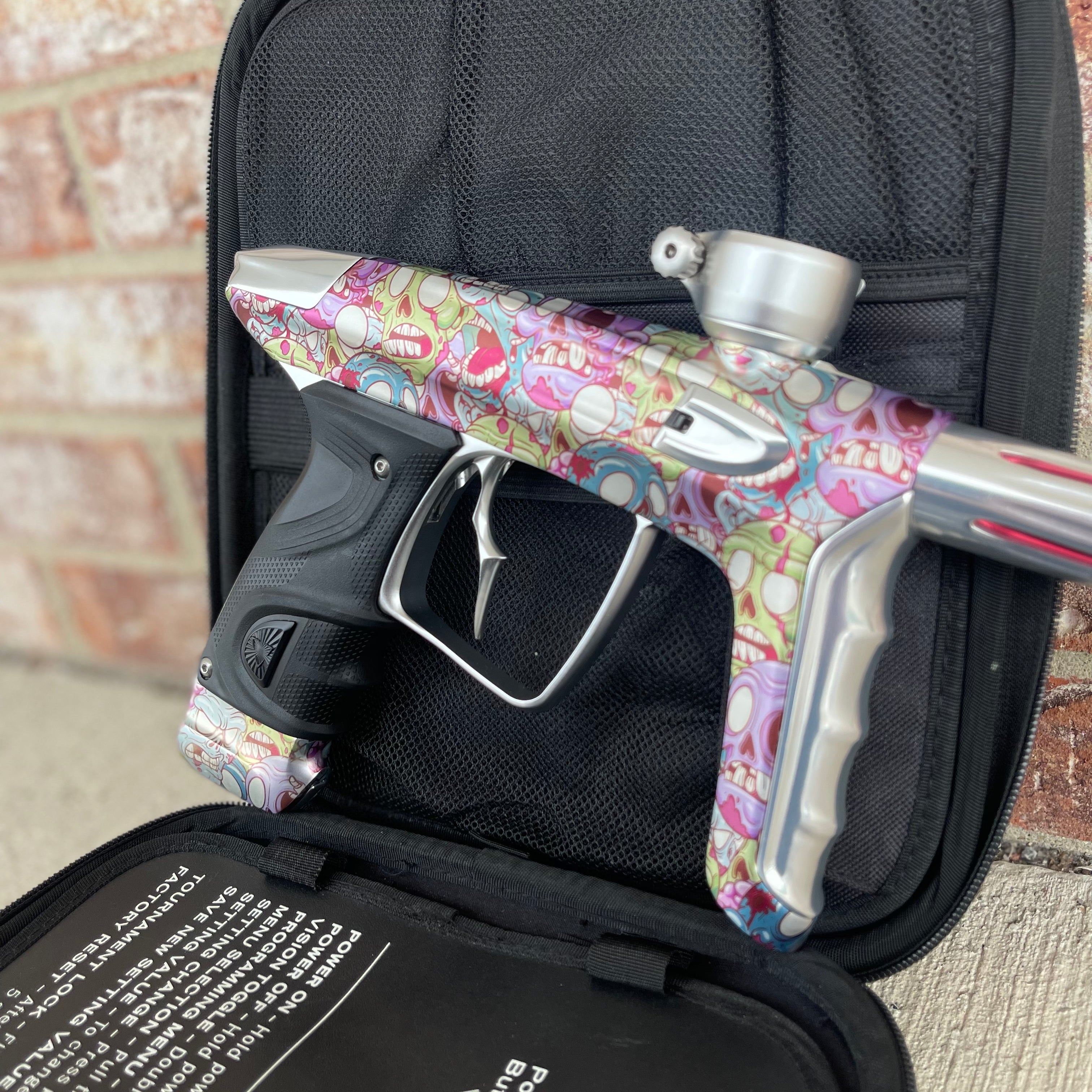 Used DLX Luxe TM40 Paintball Gun - LE Zombie Edition w/Silver Deuce Trigger & Wireless Charger