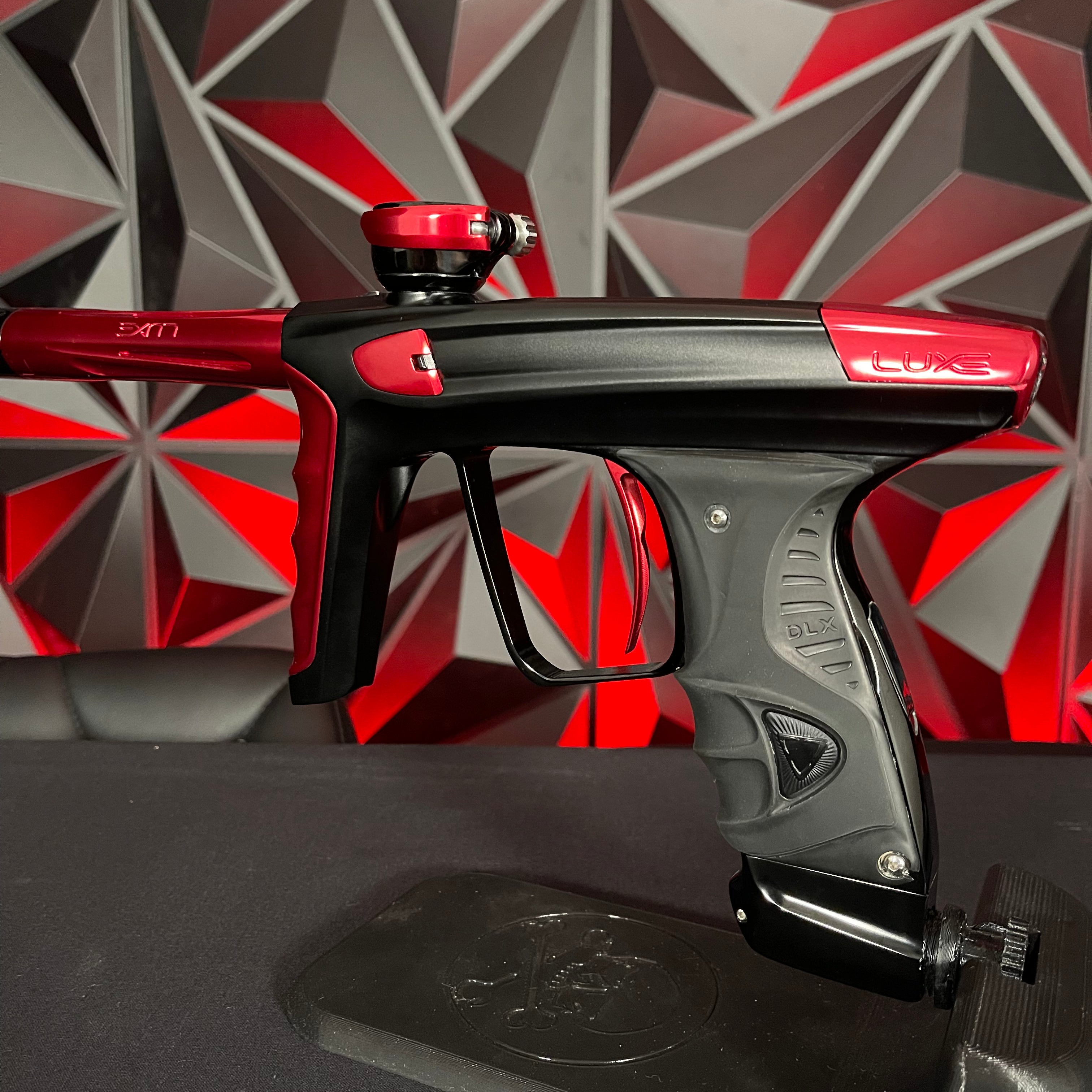 Used DLX Luxe X Paintball Gun - Dust Black Body/Gloss Trigger Frame/Red Accents