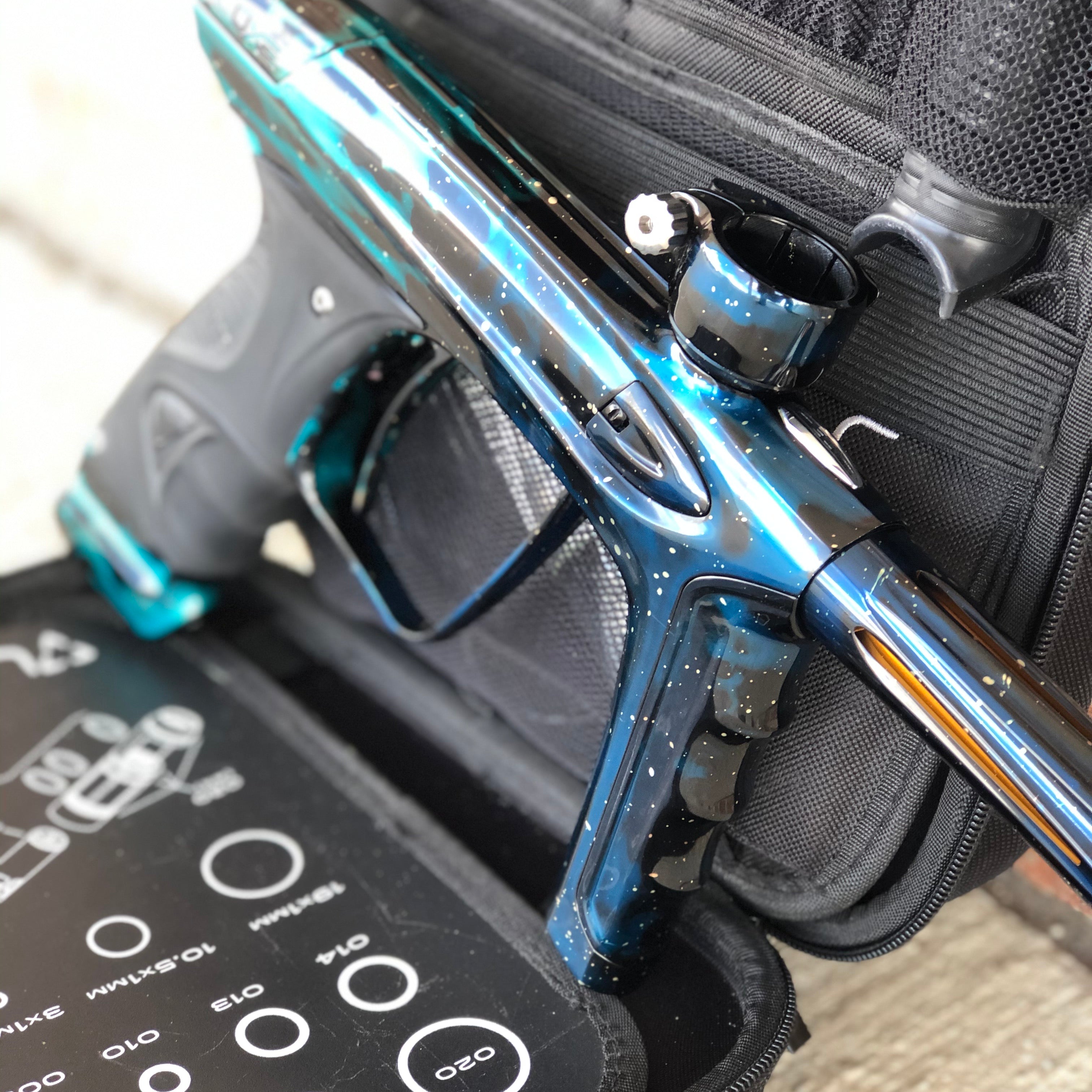 Used DLX Luxe Ice Paintball Gun - Galaxy Teal/Black/Blue