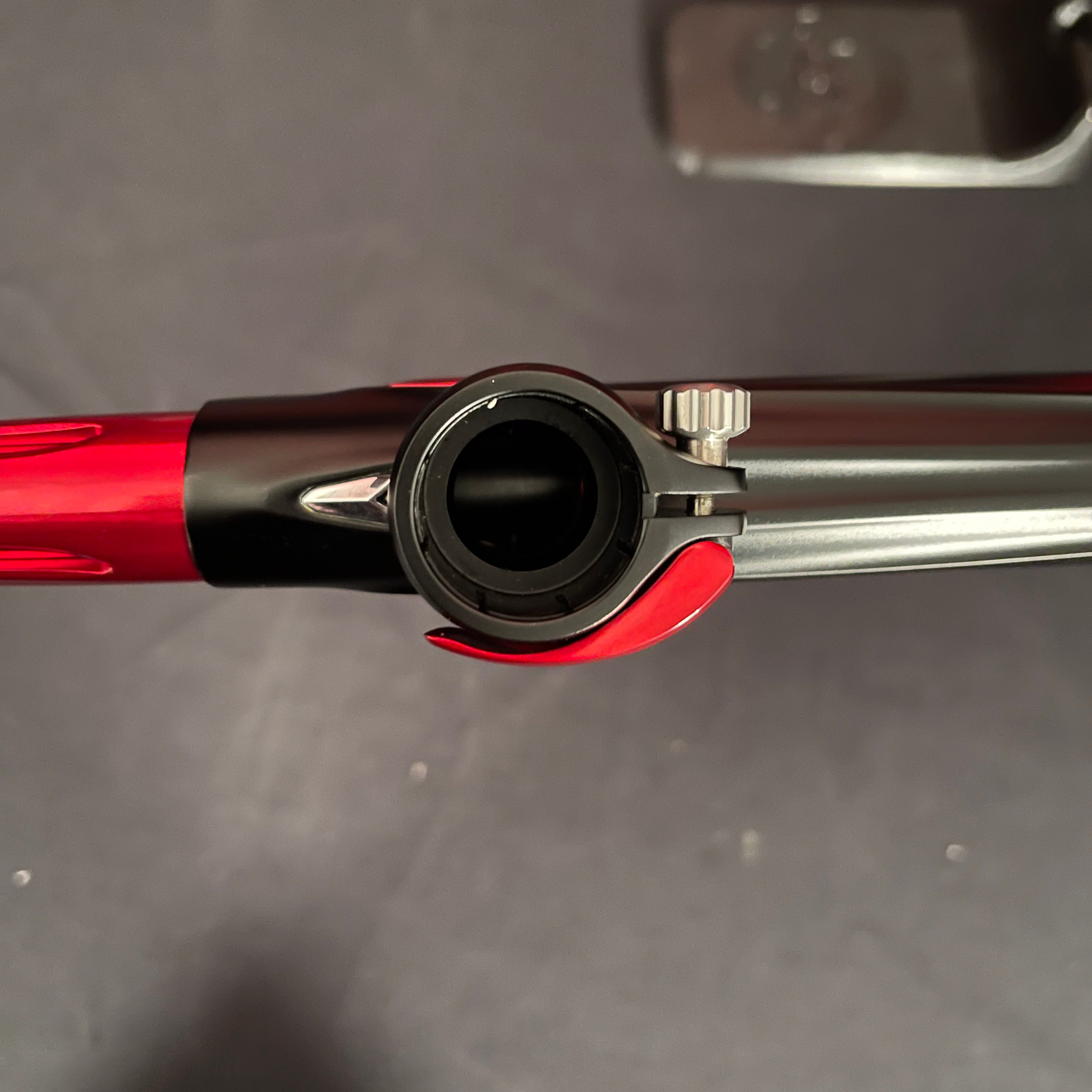 Used DLX Luxe TM40 Paintball Gun - Dust Black/Gloss Red