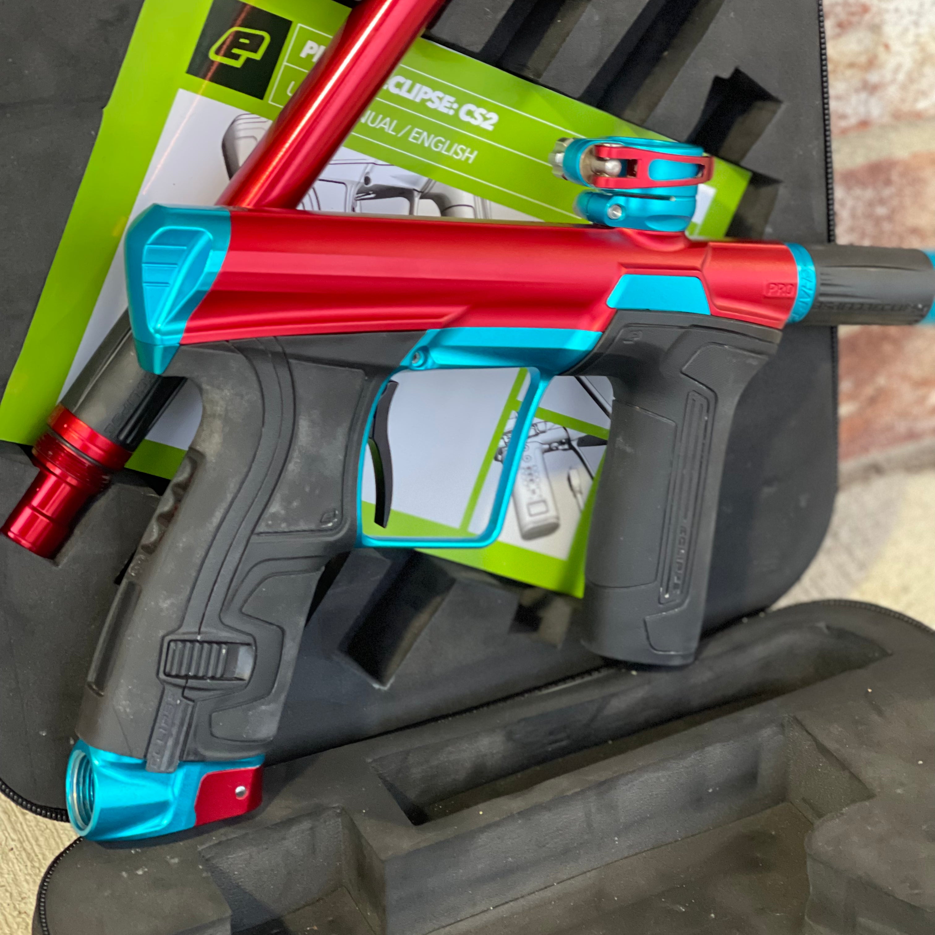Used Planet Eclipse CS2 Pro Paintball Gun - Red/Teal