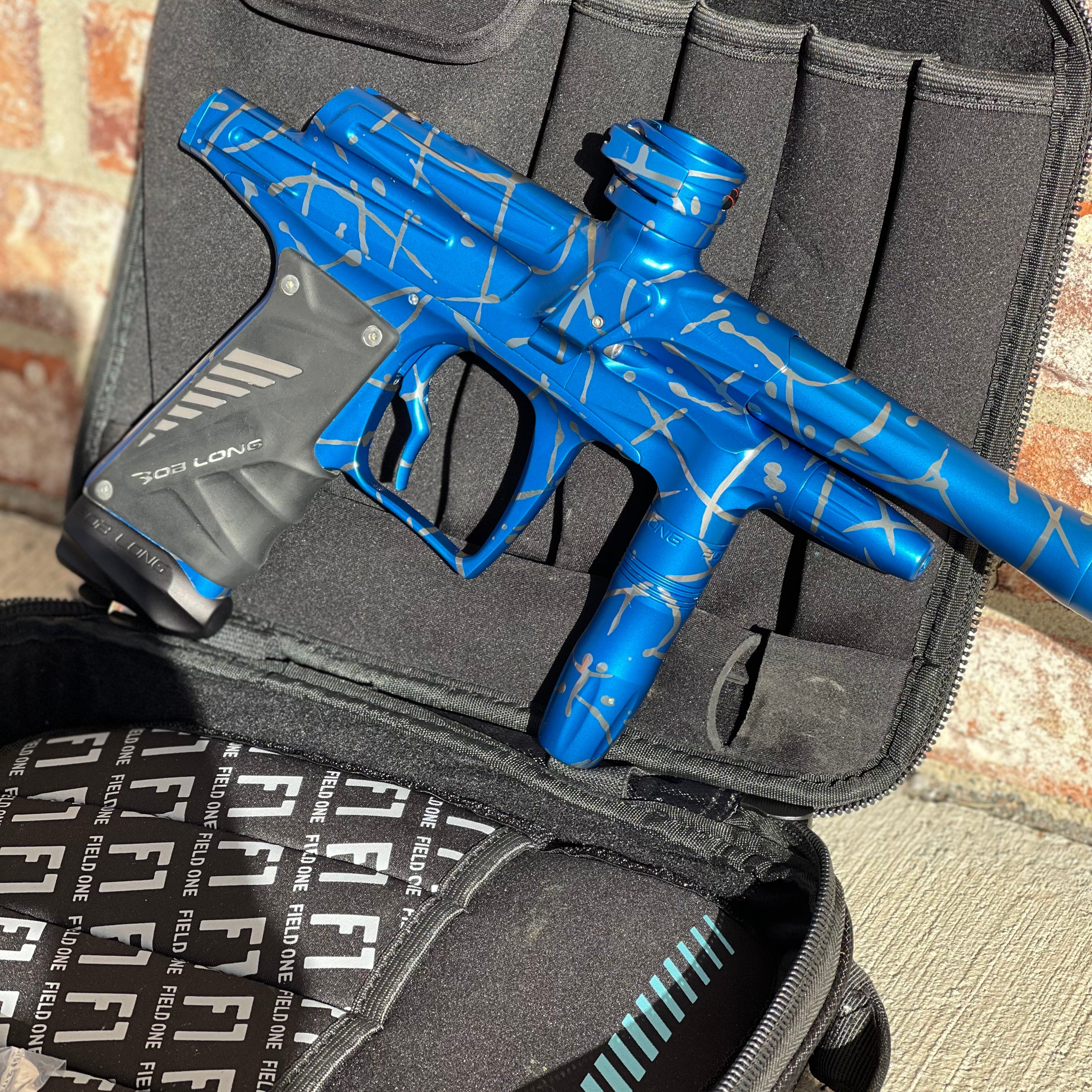 Used Bob Long G6R OLED Paintball Gun - Z Cut - Blue/Silver Splash