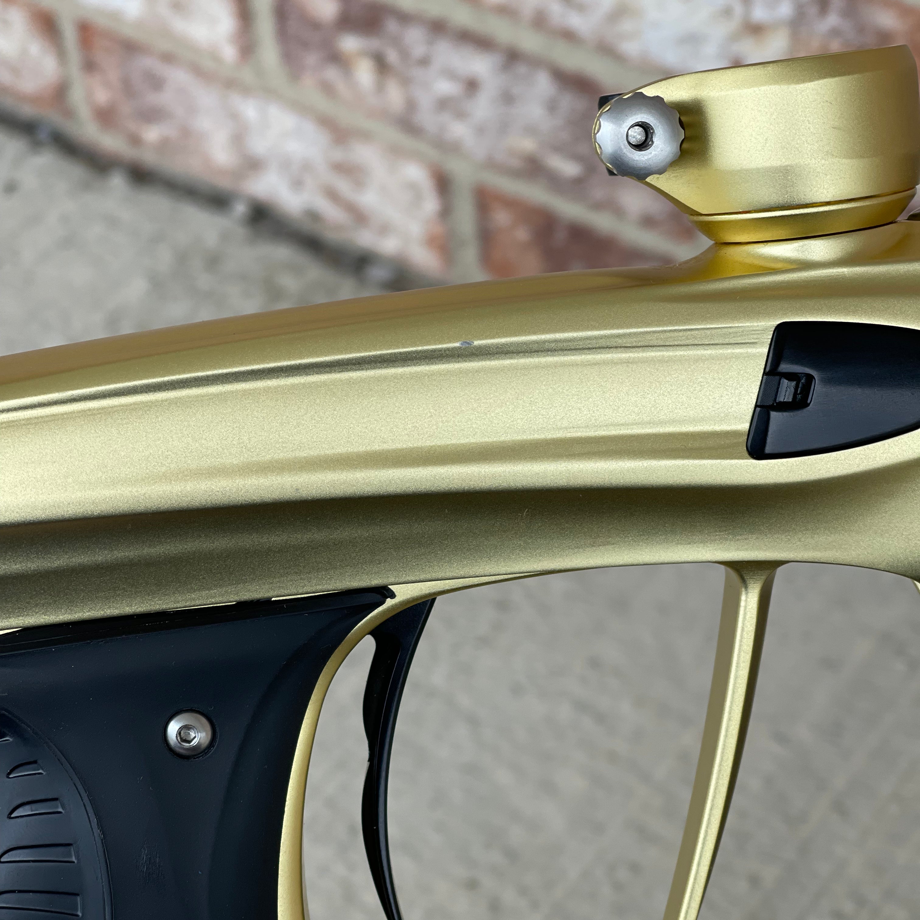 Used DLX Luxe X Paintball Gun - Dust Gold / Polished Black