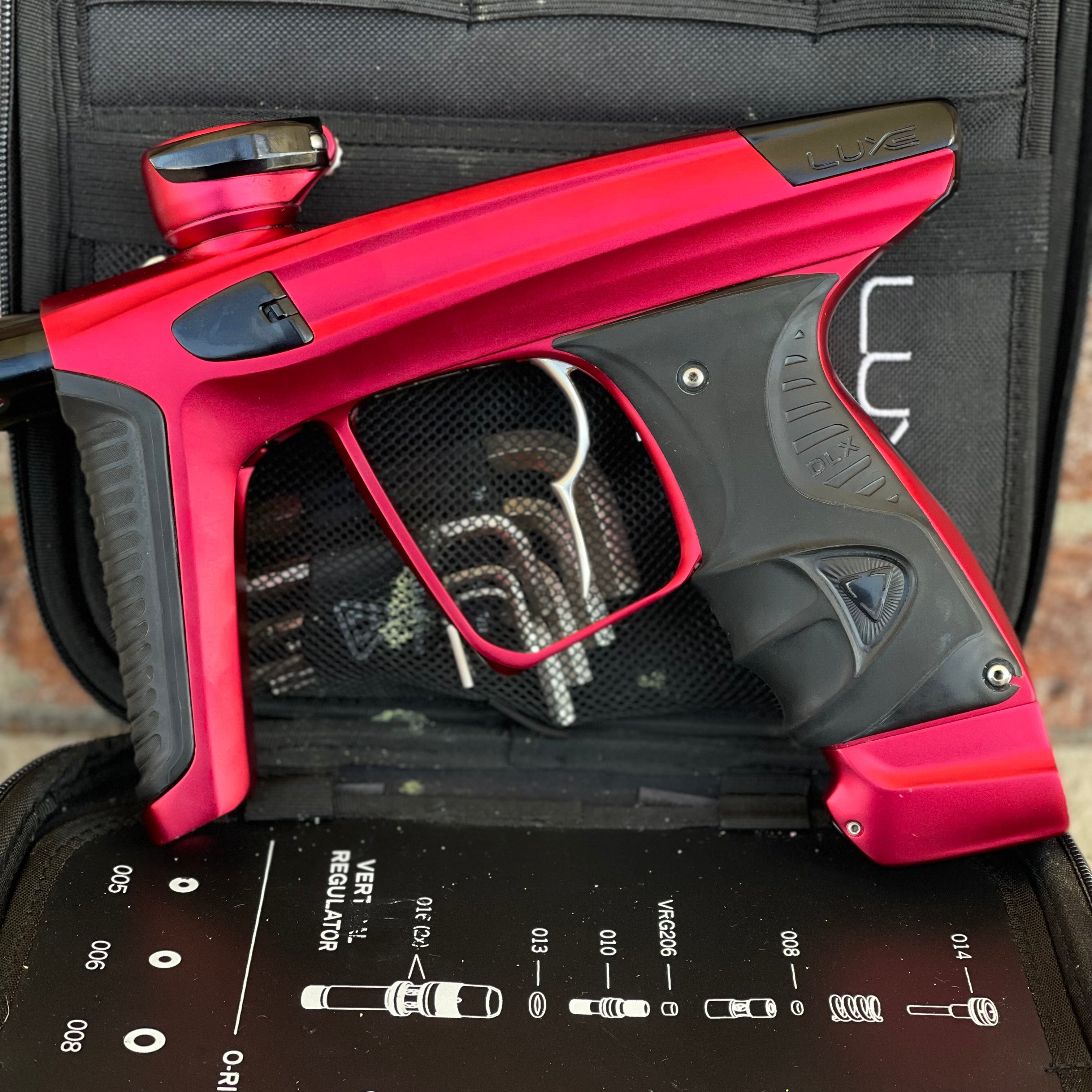 Used DLX Luxe X Paintball Gun - Dust Red w/ Infamous Deuce Trigger
