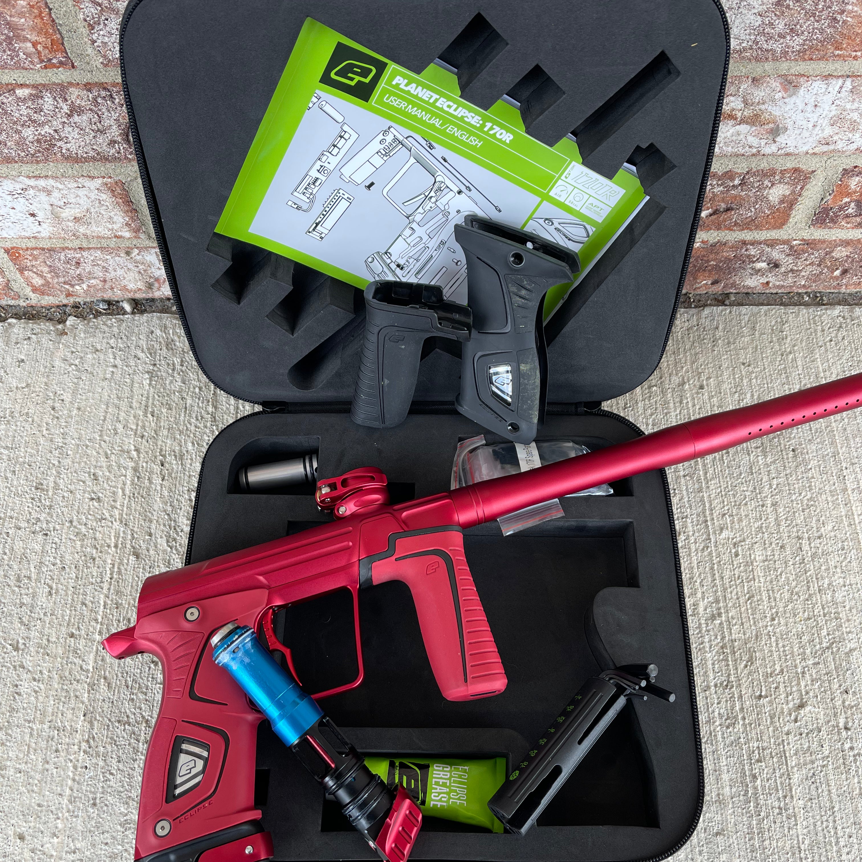 Used Planet Eclipse 170R Paintball Gun - Dust Red w/Red Grip Kit, Deuce Trigger, and ST3 Bolt