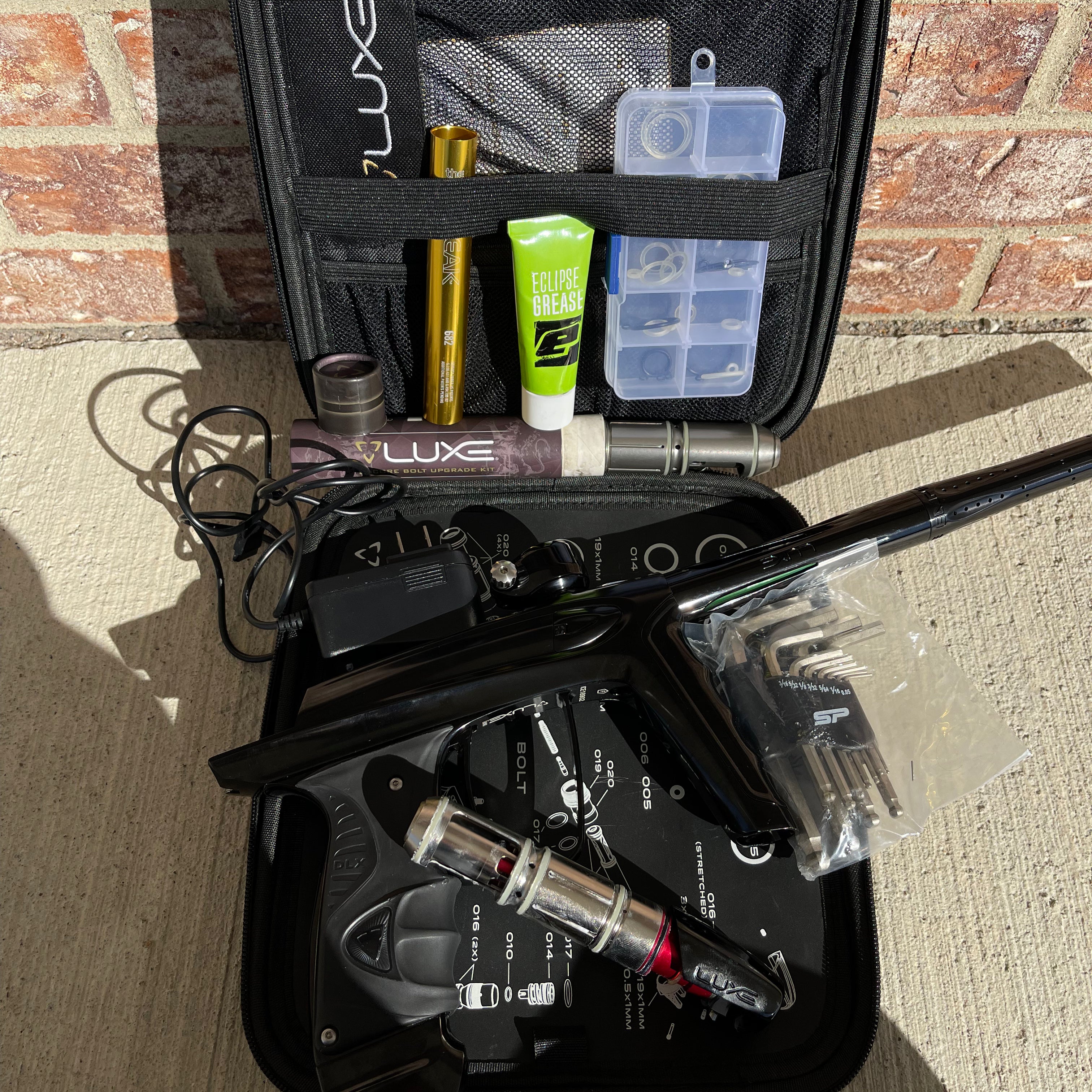 Used DLX Luxe Ice Paintball Gun - Polished Black w/ Encore Bolt