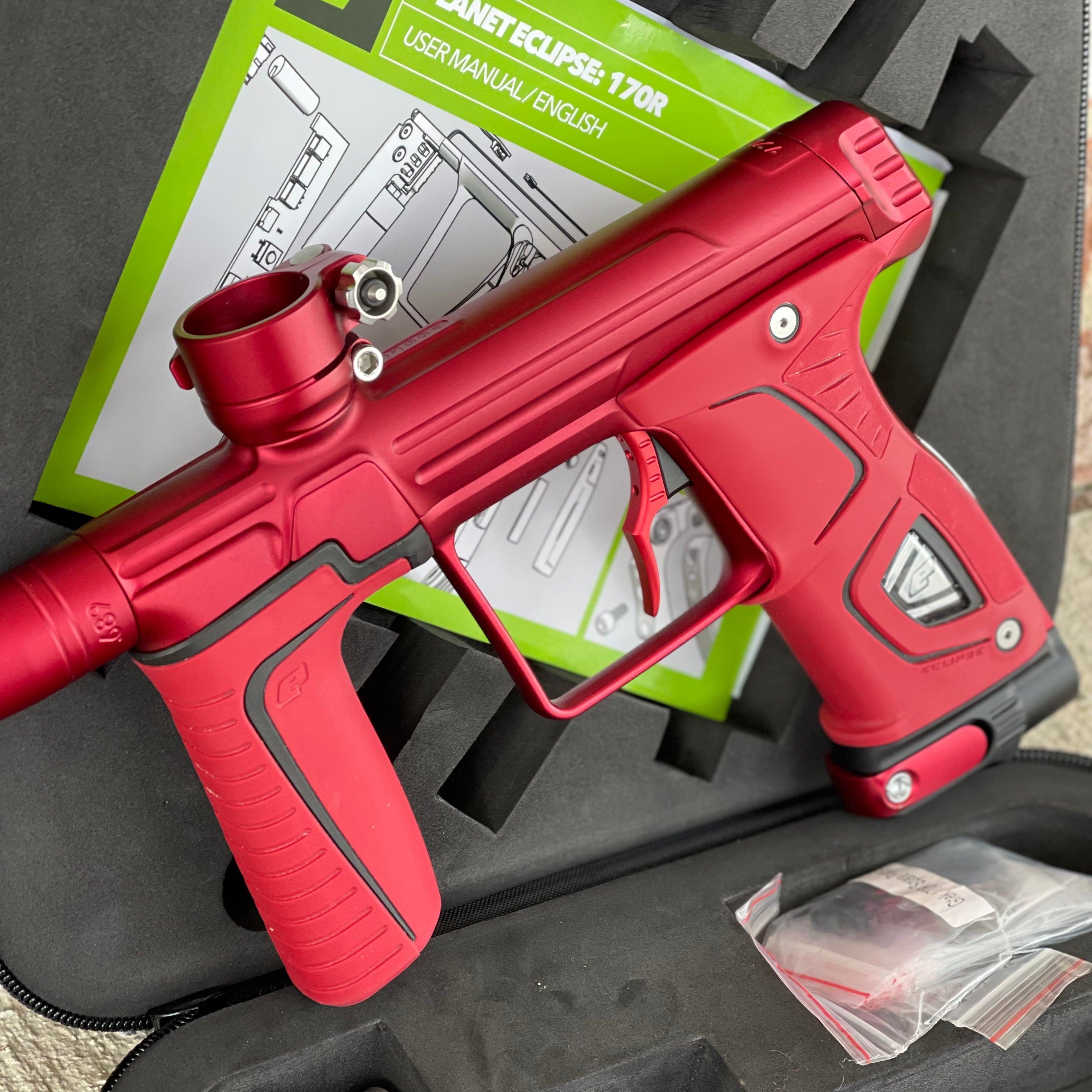 Used Planet Eclipse 170R Paintball Gun - Dust Red w/Red Grip Kit, Deuce Trigger, and ST3 Bolt