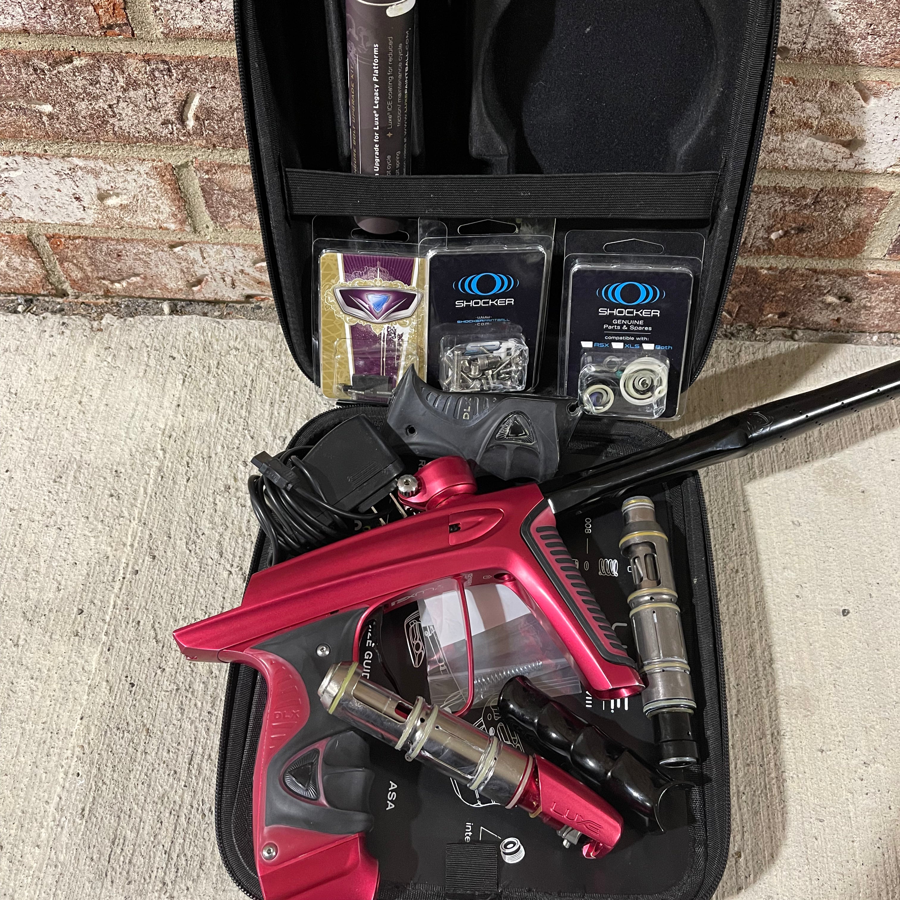 Used DLX Luxe Ice Paintball Gun - Dust Red / Dust Red w/ Inception Barrel, Encore Bolt/Stock Bolt, Scythe Trigger and Stock Trigger, Large Spare Part Kits