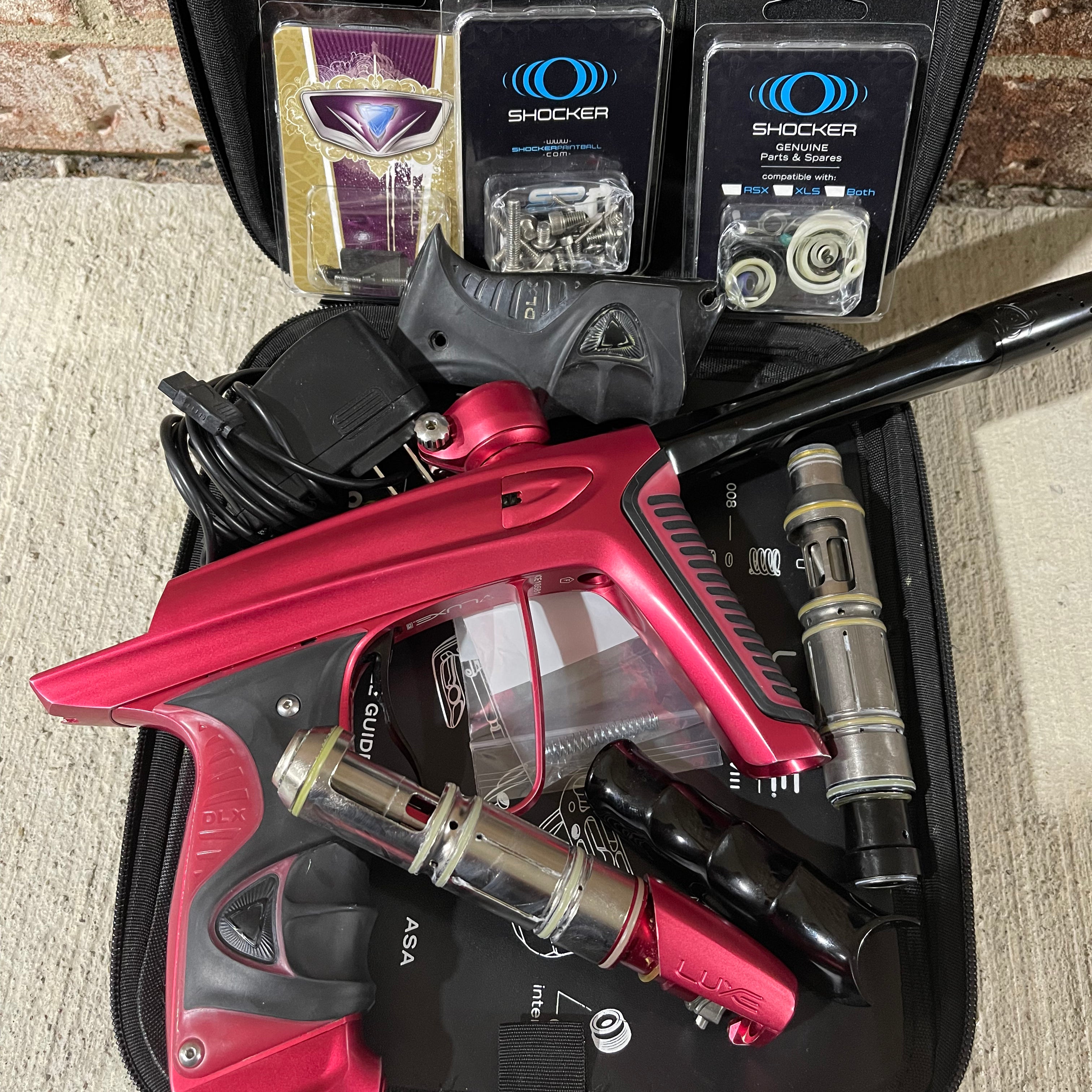 Used DLX Luxe Ice Paintball Gun - Dust Red / Dust Red w/ Inception Barrel, Encore Bolt/Stock Bolt, Scythe Trigger and Stock Trigger, Large Spare Part Kits