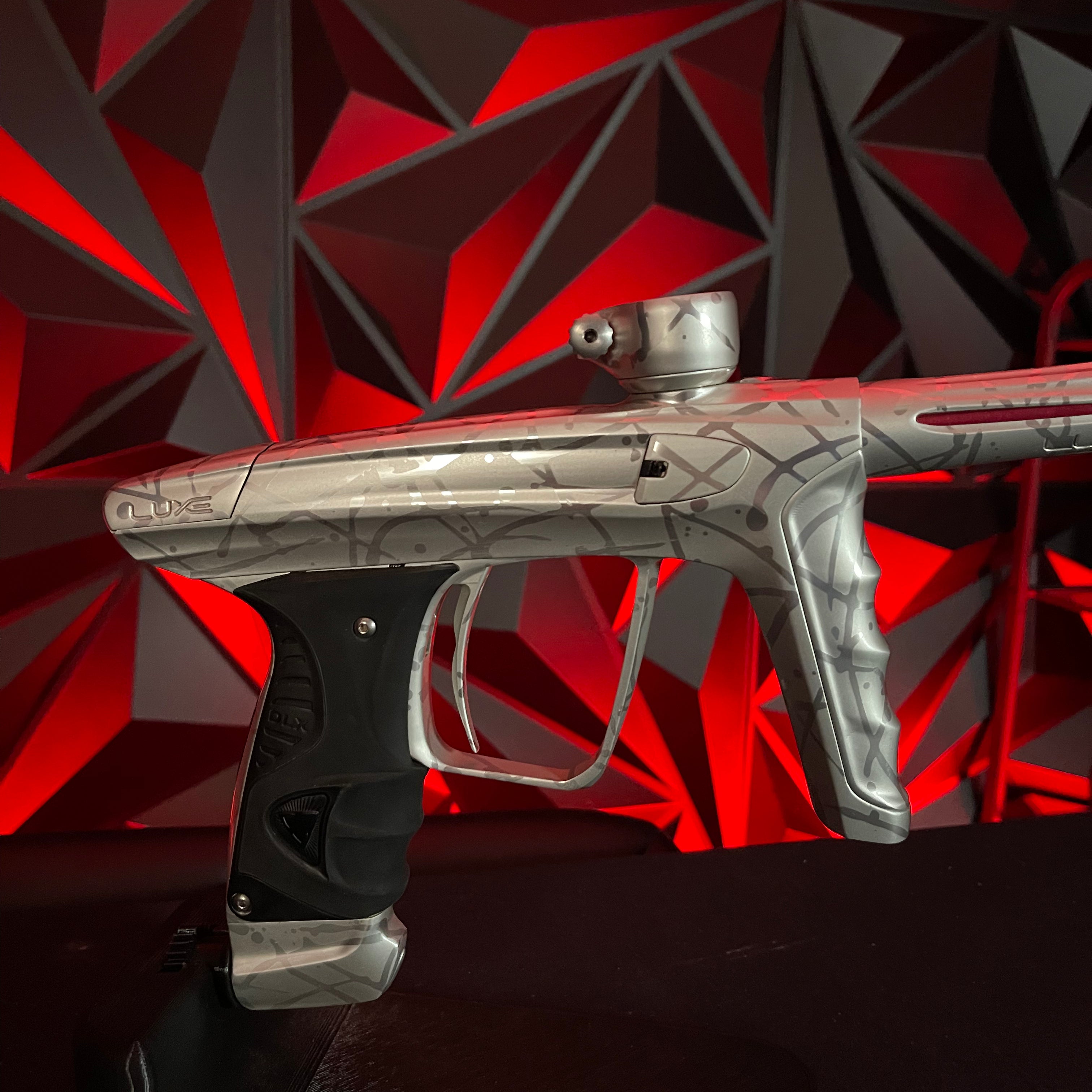 Used DLX Luxe X Paintball Gun - Silver Splash