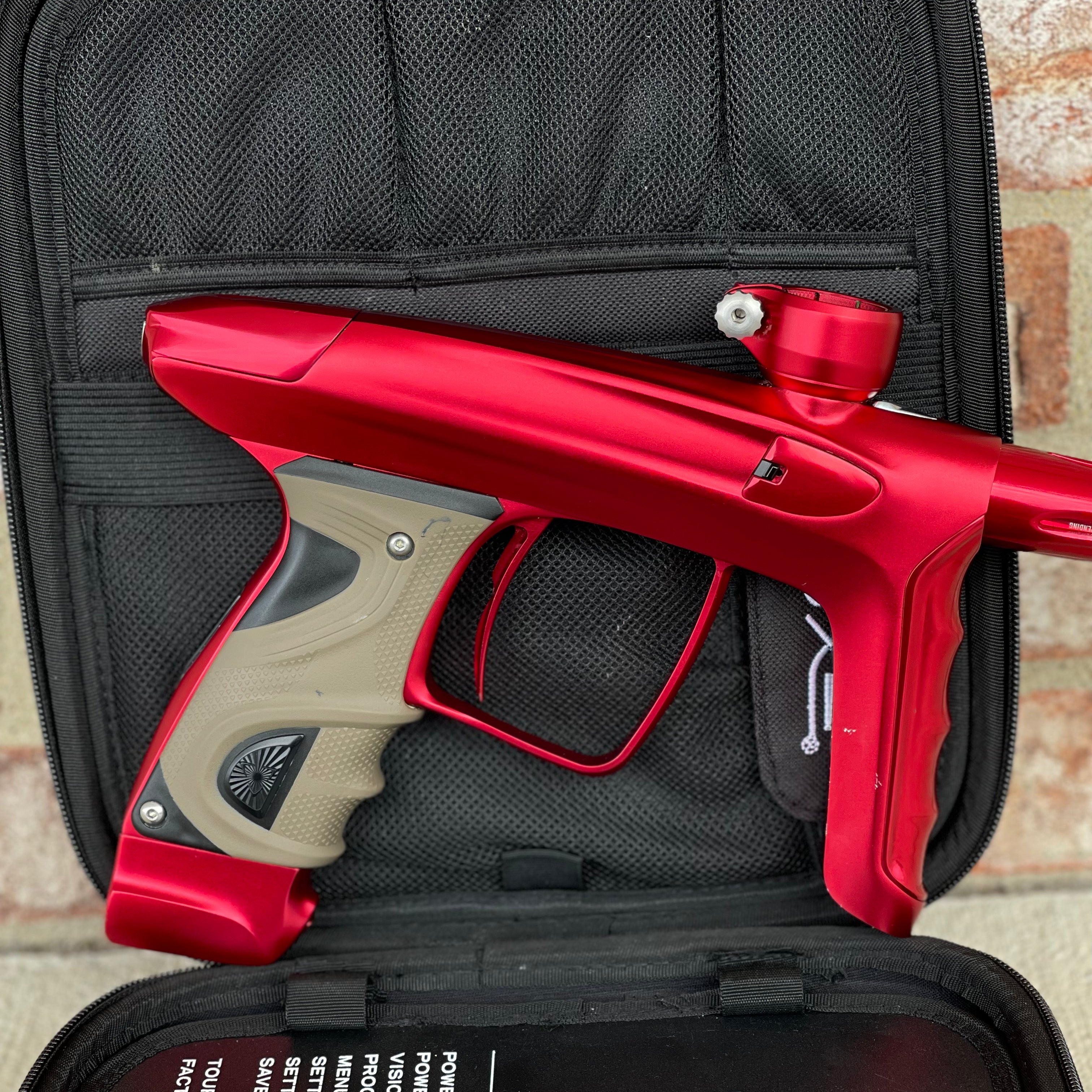 Used DLX Luxe TM40 Paintball Gun - Dust Red / Gloss Red w/ 2 back grips and SSC Soft Tip Bolt