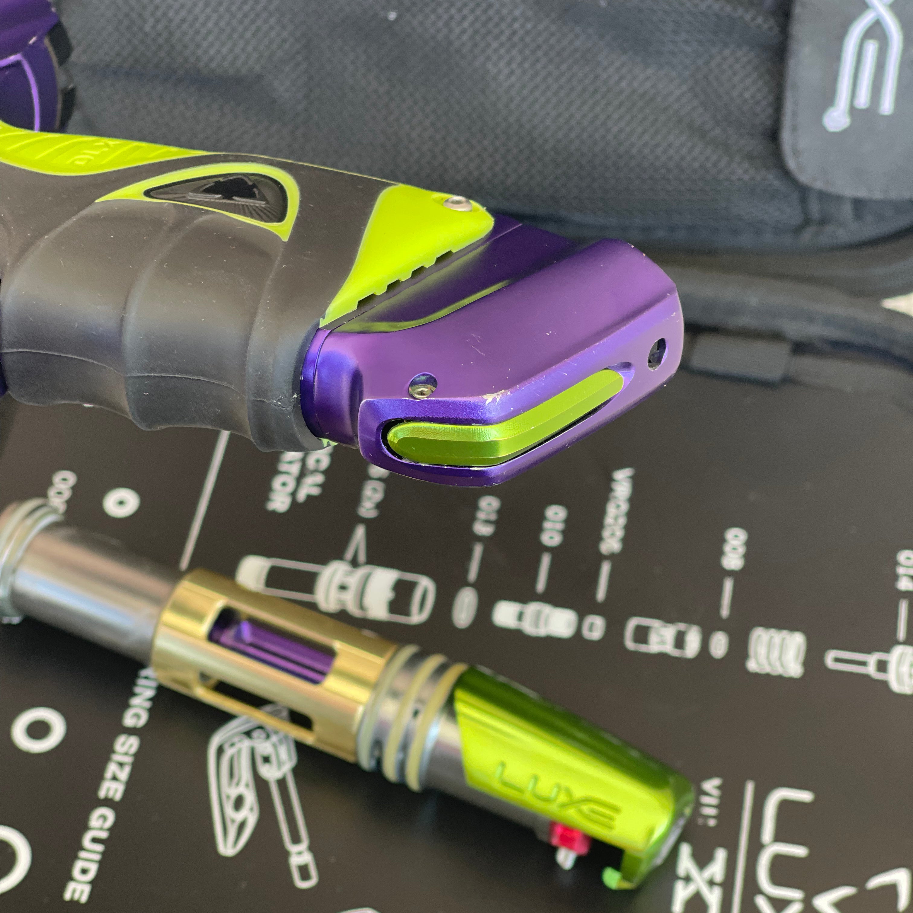 Used DLX Luxe X Paintball Gun - Dust Purple / Polished Green