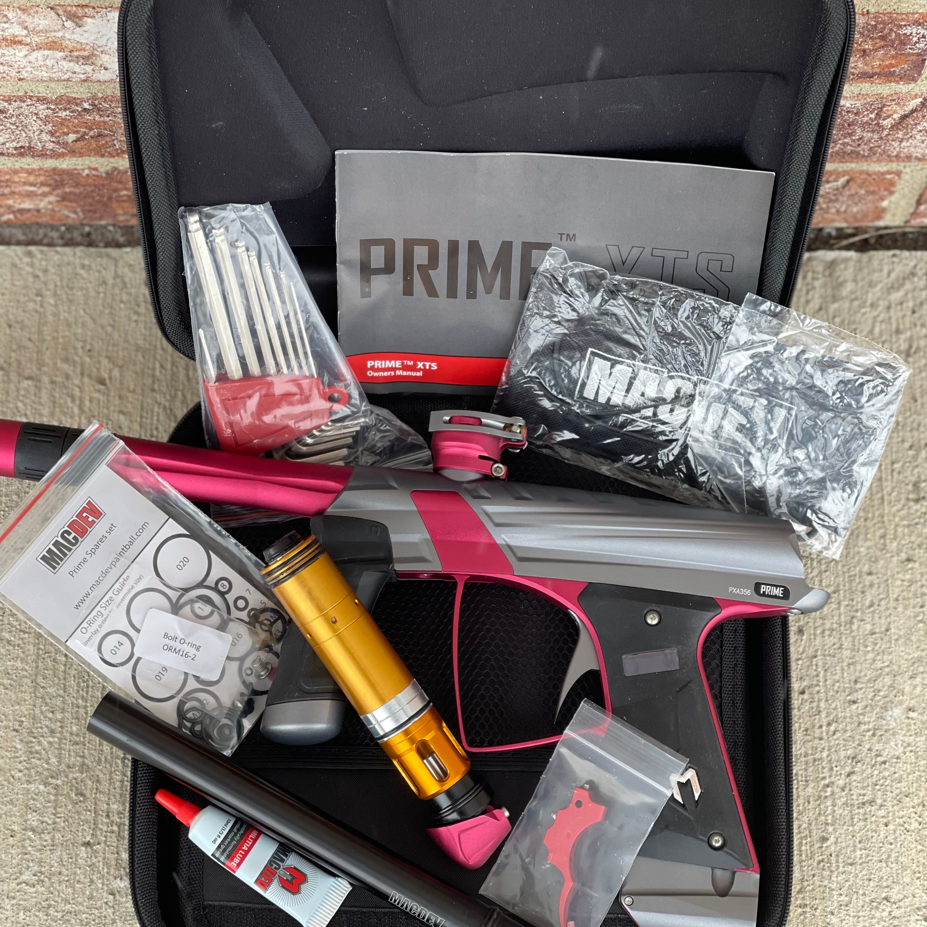 Used MacDev Prime XTS Paintball Gun - Dust Grey / Dust Red w/ additional Stock Deuce Trigger