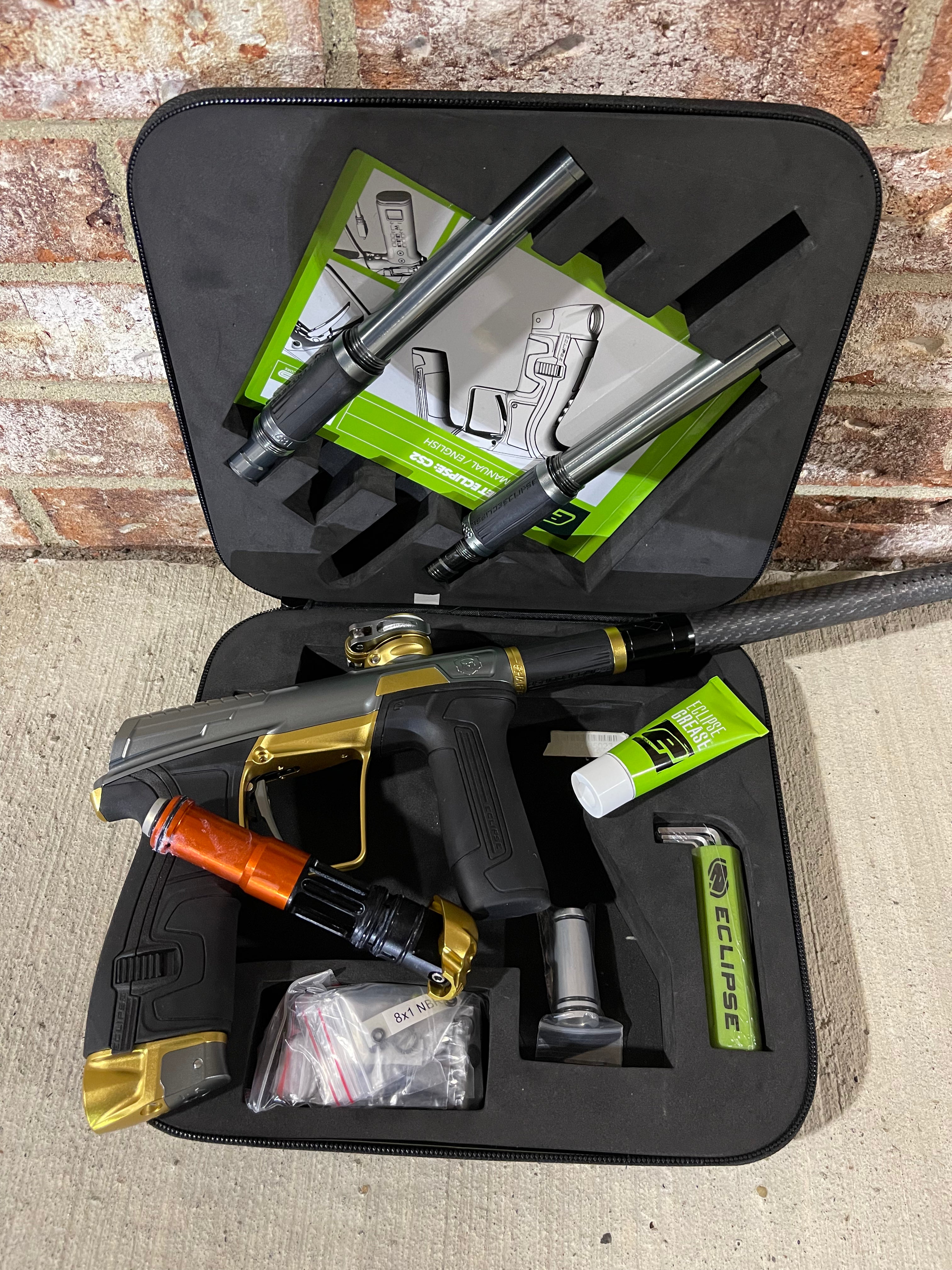 Used Infamous / Planet Eclipse CS2 Paintball Gun - Grey / Gold w/ 3 FL Inserts