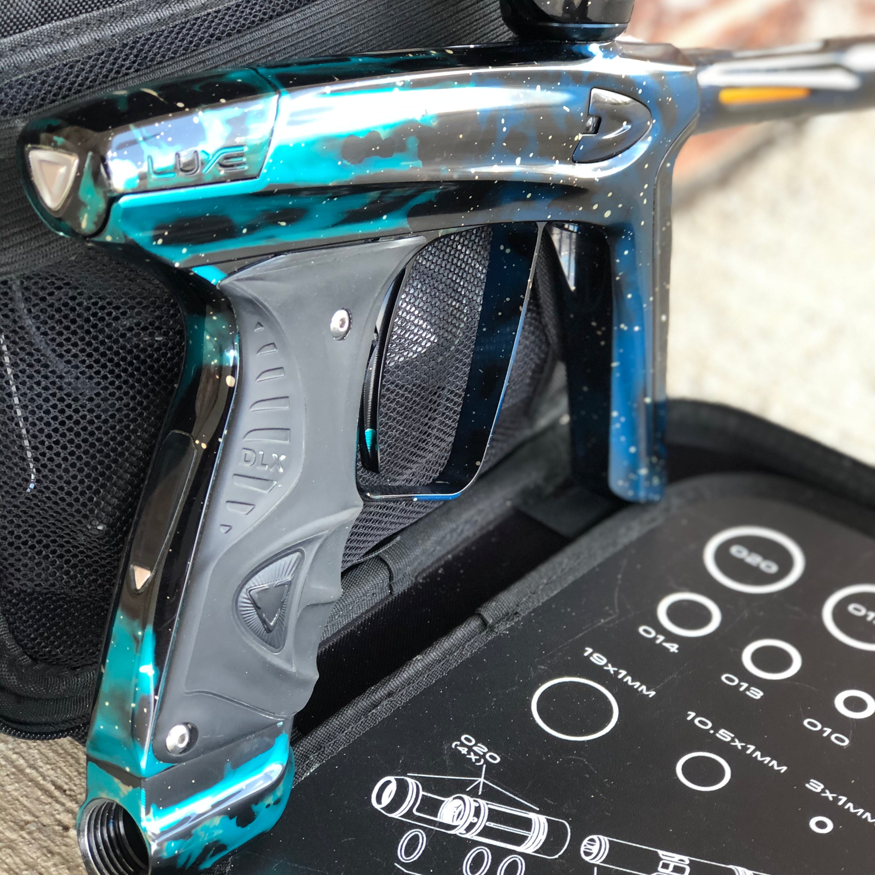 Used DLX Luxe Ice Paintball Gun - Galaxy Teal/Black/Blue