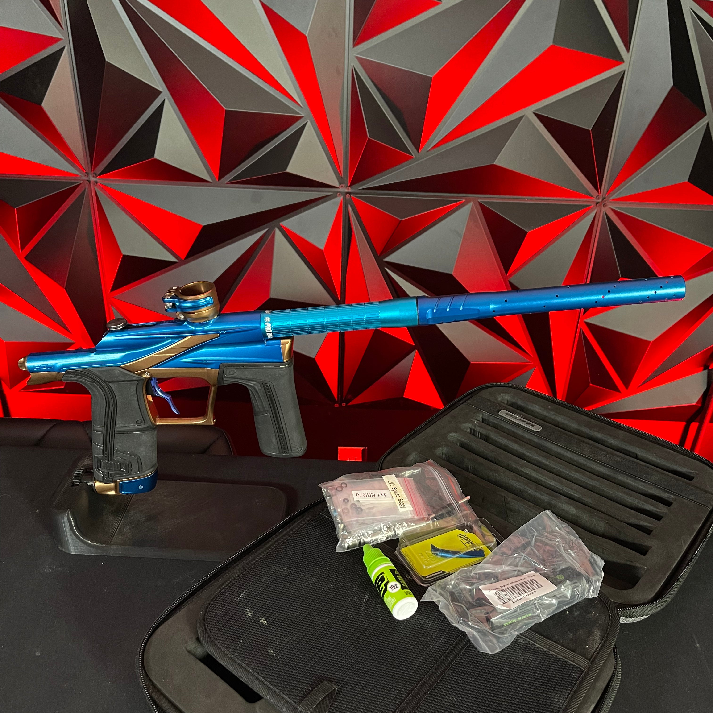 Used Planet Eclipse LV2 Paintball Gun - Blue/Bronze w/ Silencio Power Grip Back *Houston Heat Signed Case*