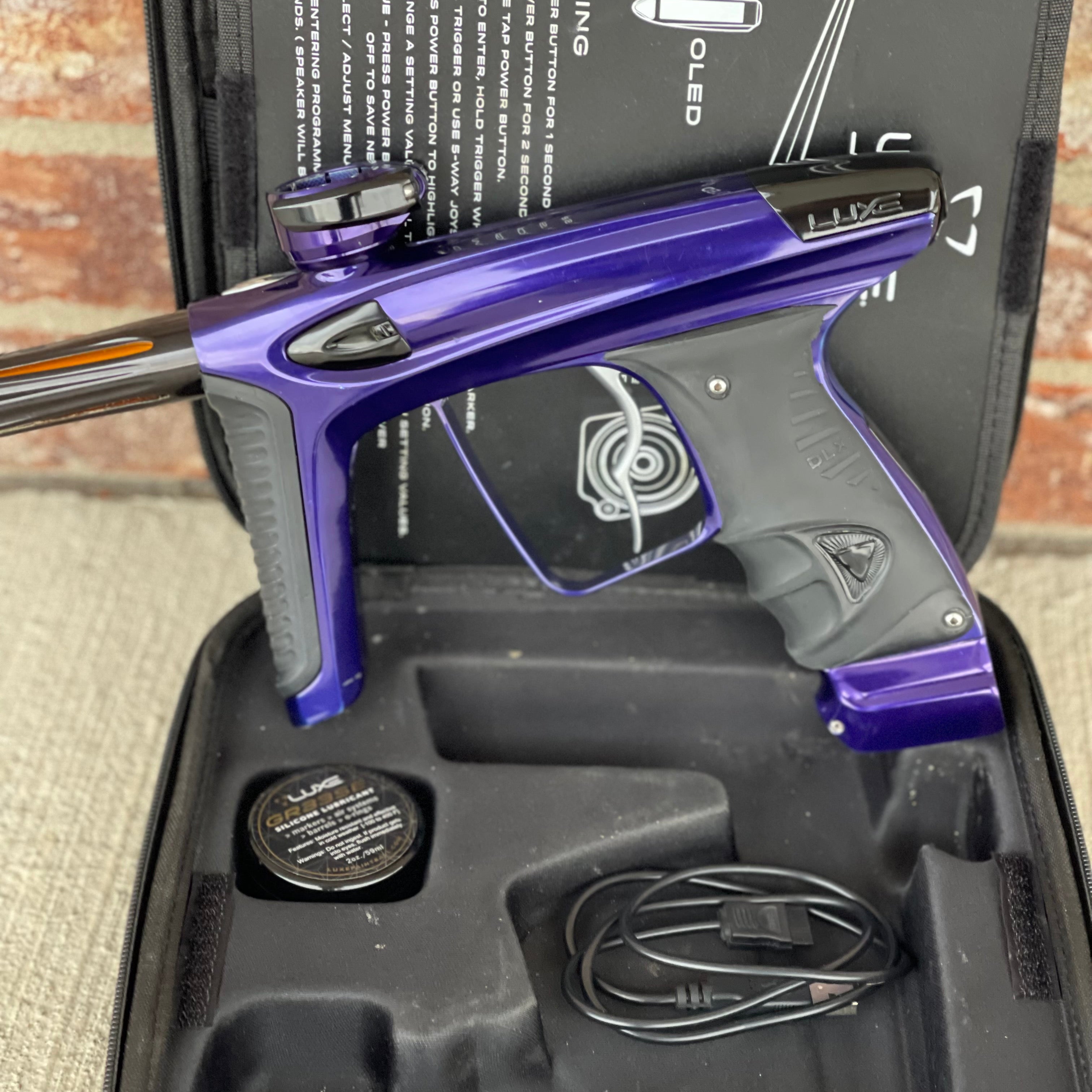 Used DLX Luxe Ice Paintball Gun - Purple / Black