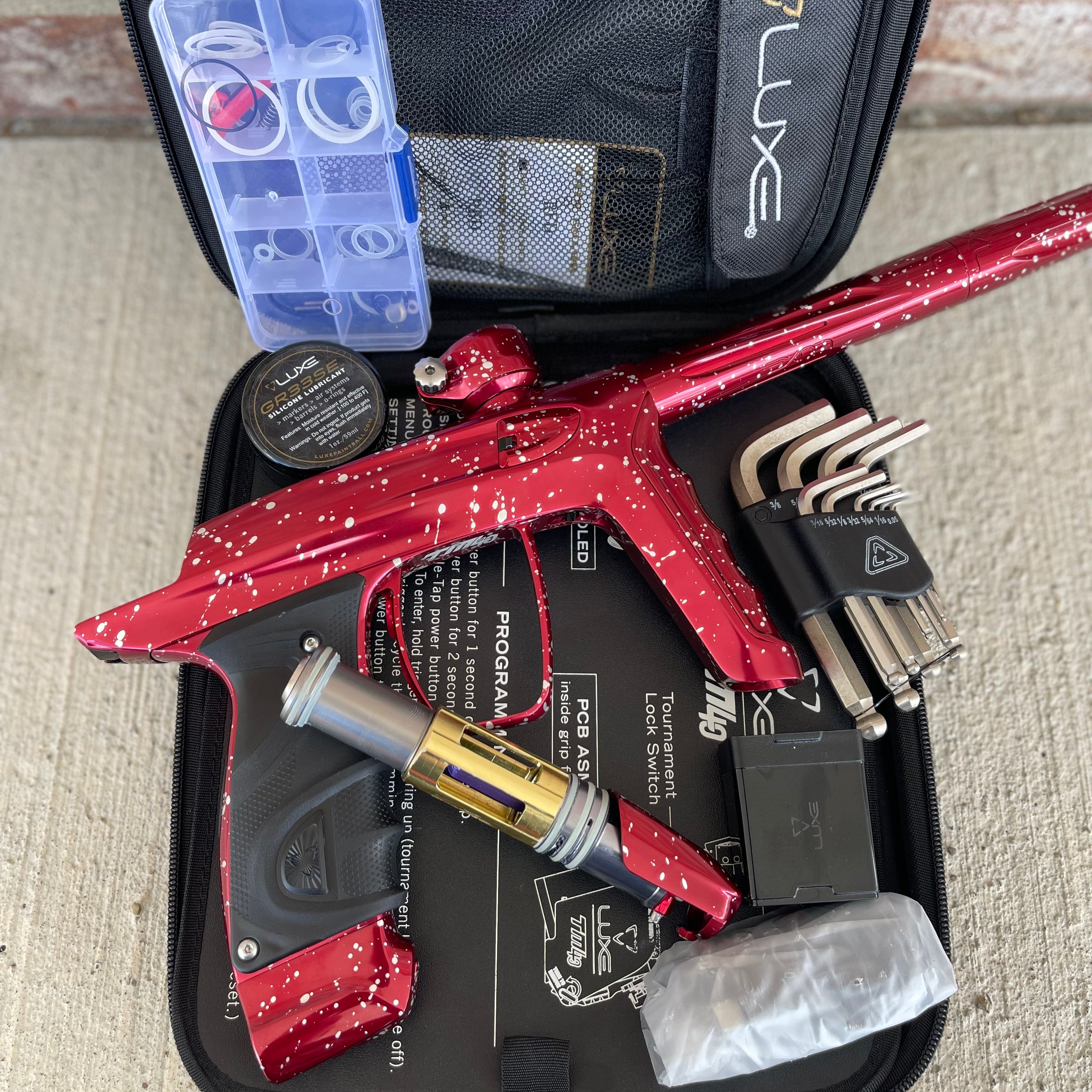 Used DLX Luxe TM40 Paintball Gun - LE Polished Red with White Speckling
