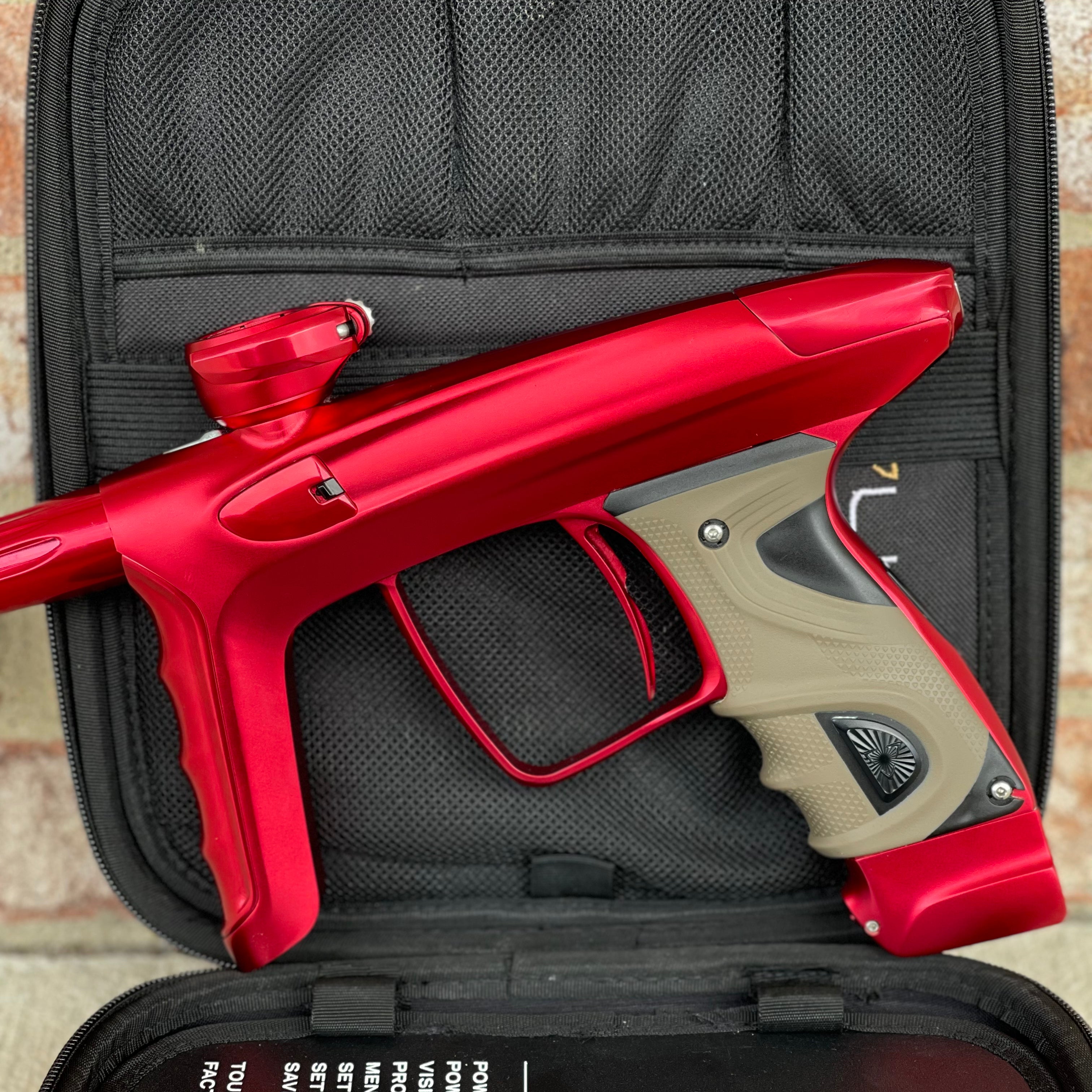 Used DLX Luxe TM40 Paintball Gun - Dust Red / Gloss Red w/ 2 back grips and SSC Soft Tip Bolt