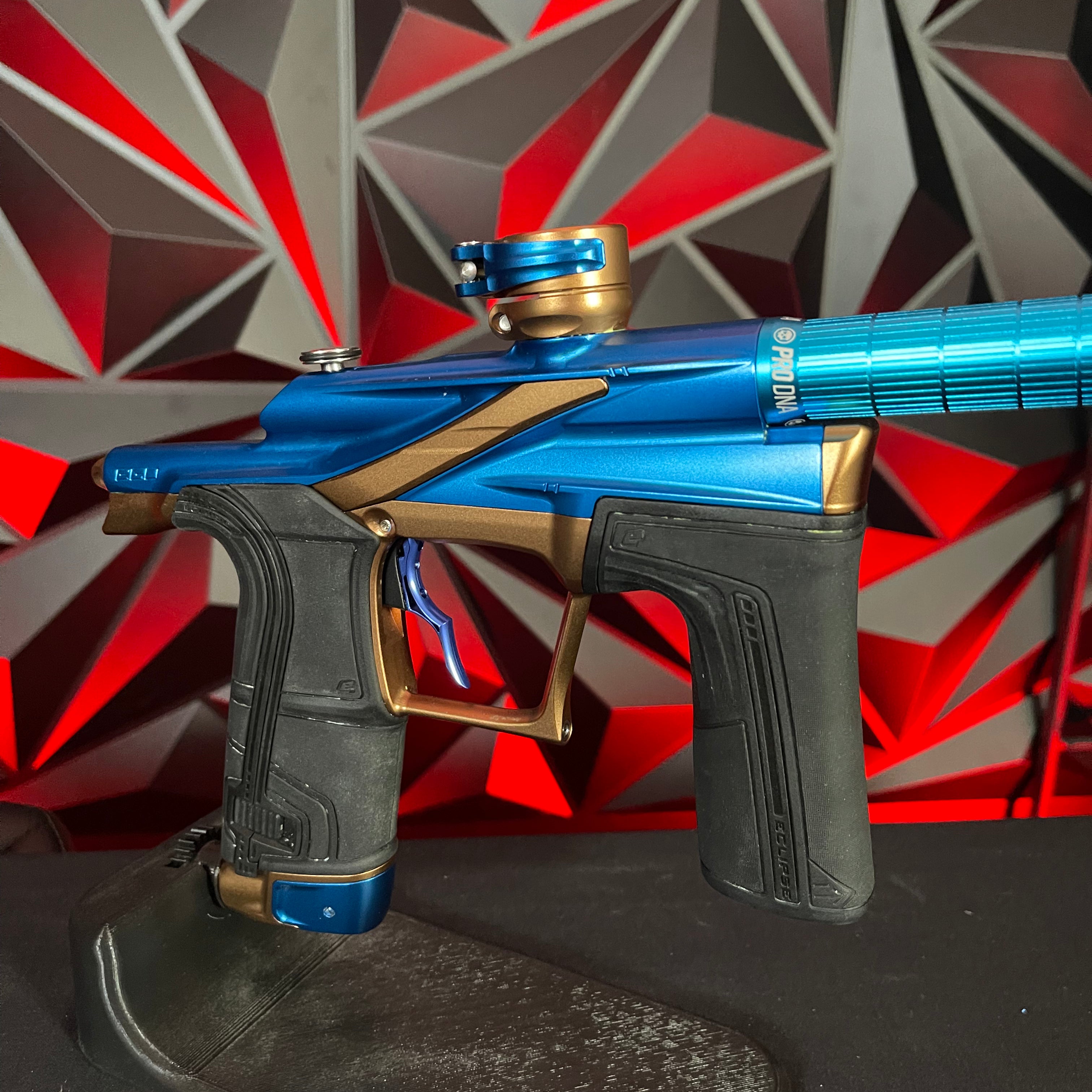 Used Planet Eclipse LV2 Paintball Gun - Blue/Bronze w/ Silencio Power Grip Back *Houston Heat Signed Case*