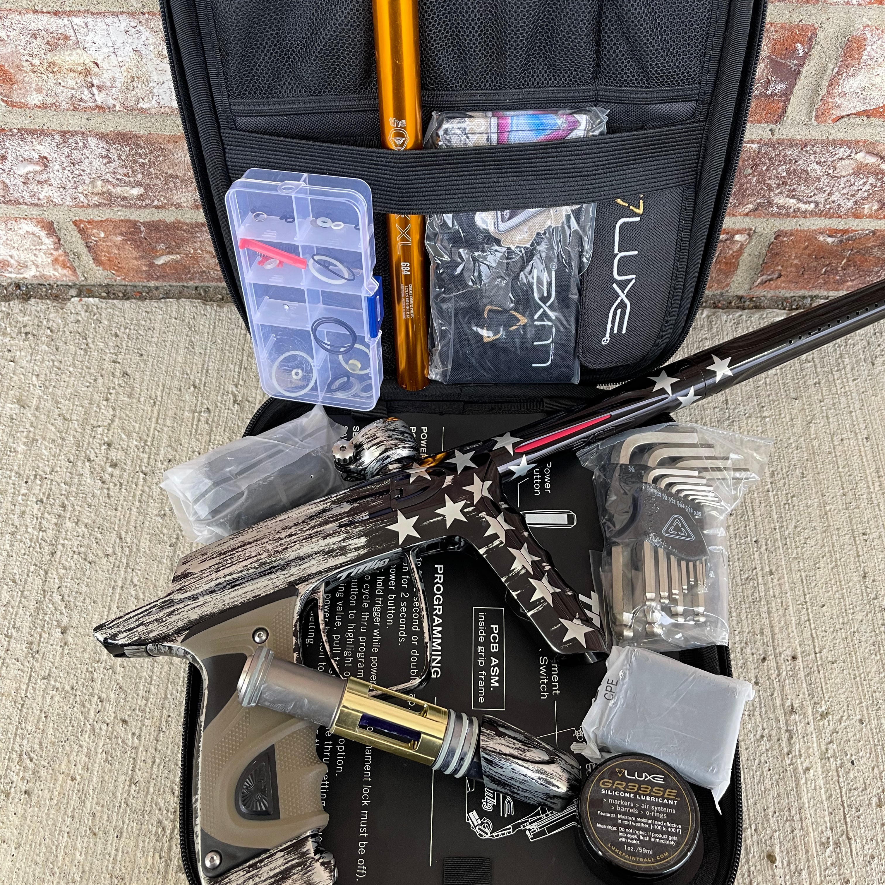 Used DLX Luxe TM40 Paintball Gun - Black Flag