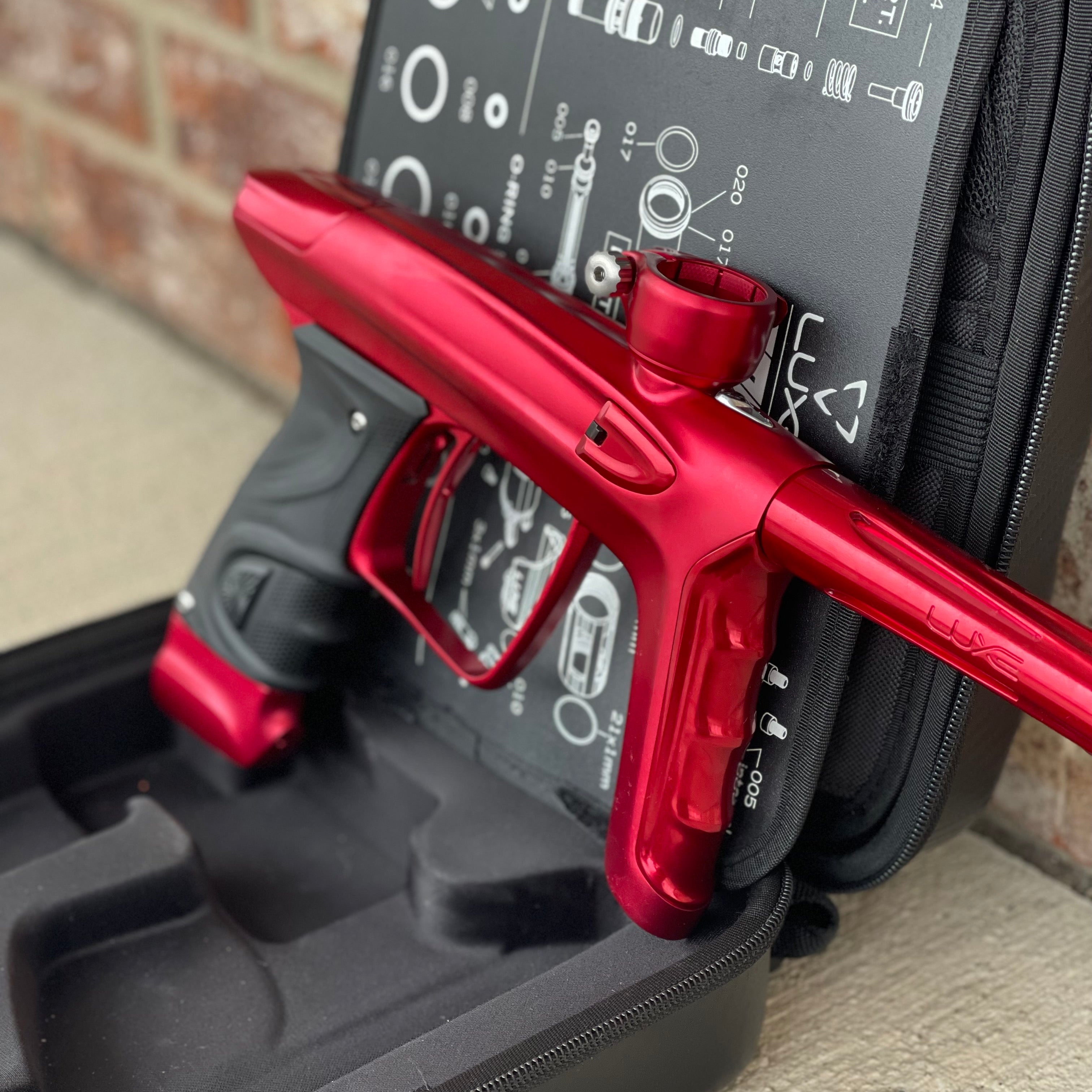 Used DLX Luxe TM40 Paintball Gun - Dust Red / Gloss Red