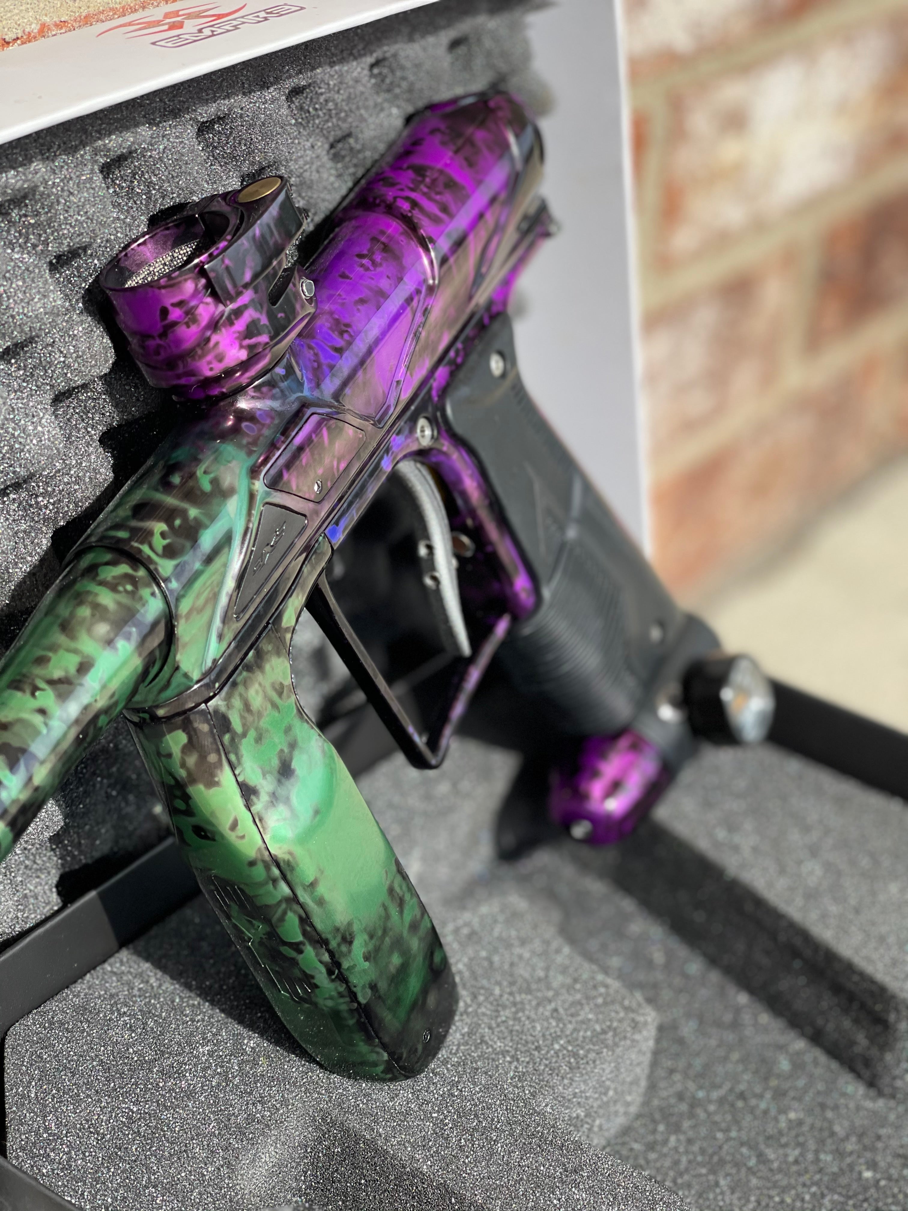 Used Empire Axe Pro Paintball Gun - Acid Wash Pruple / Green