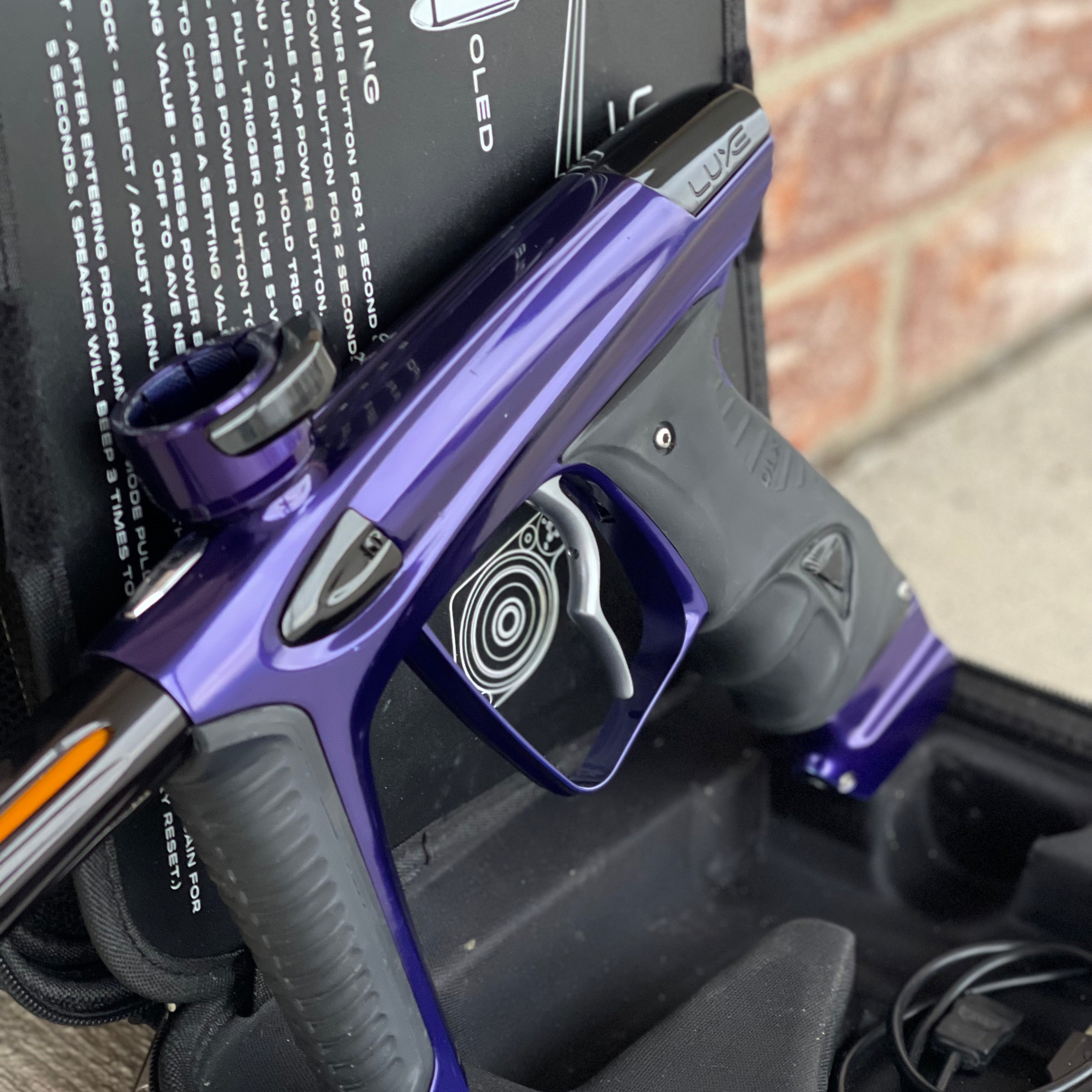 Used DLX Luxe Ice Paintball Gun - Purple / Black