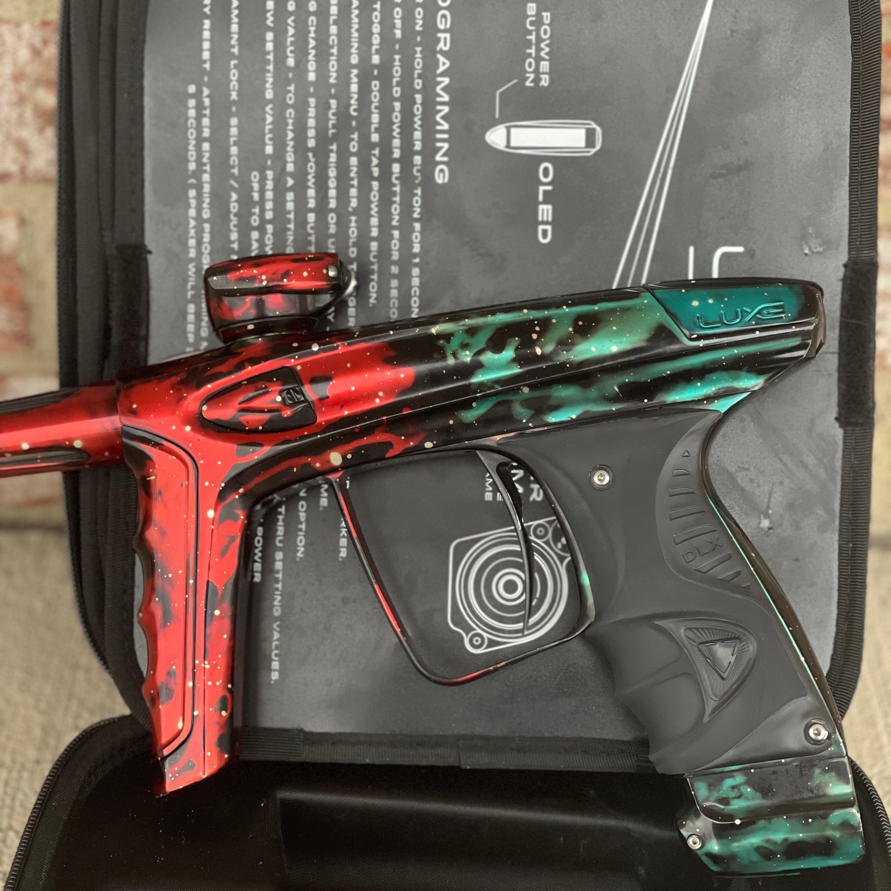 Used DLX Luxe Ice Paintball Gun - Red/Green Galaxy (1 of 15)
