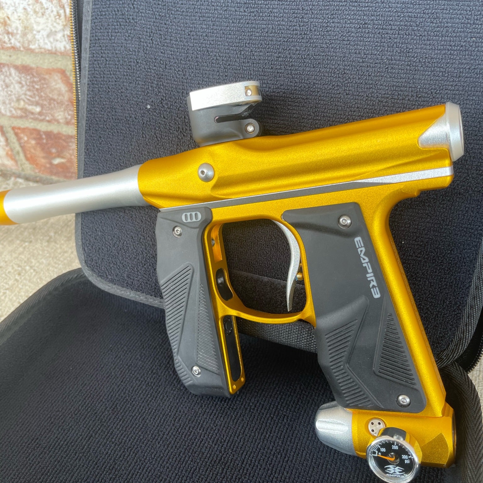 Used Empire Mini GS Paintball Gun w/ 2 Piece Barrel - Dust Gold / Silver w/ HK Army Exo 2.0 Marker Case