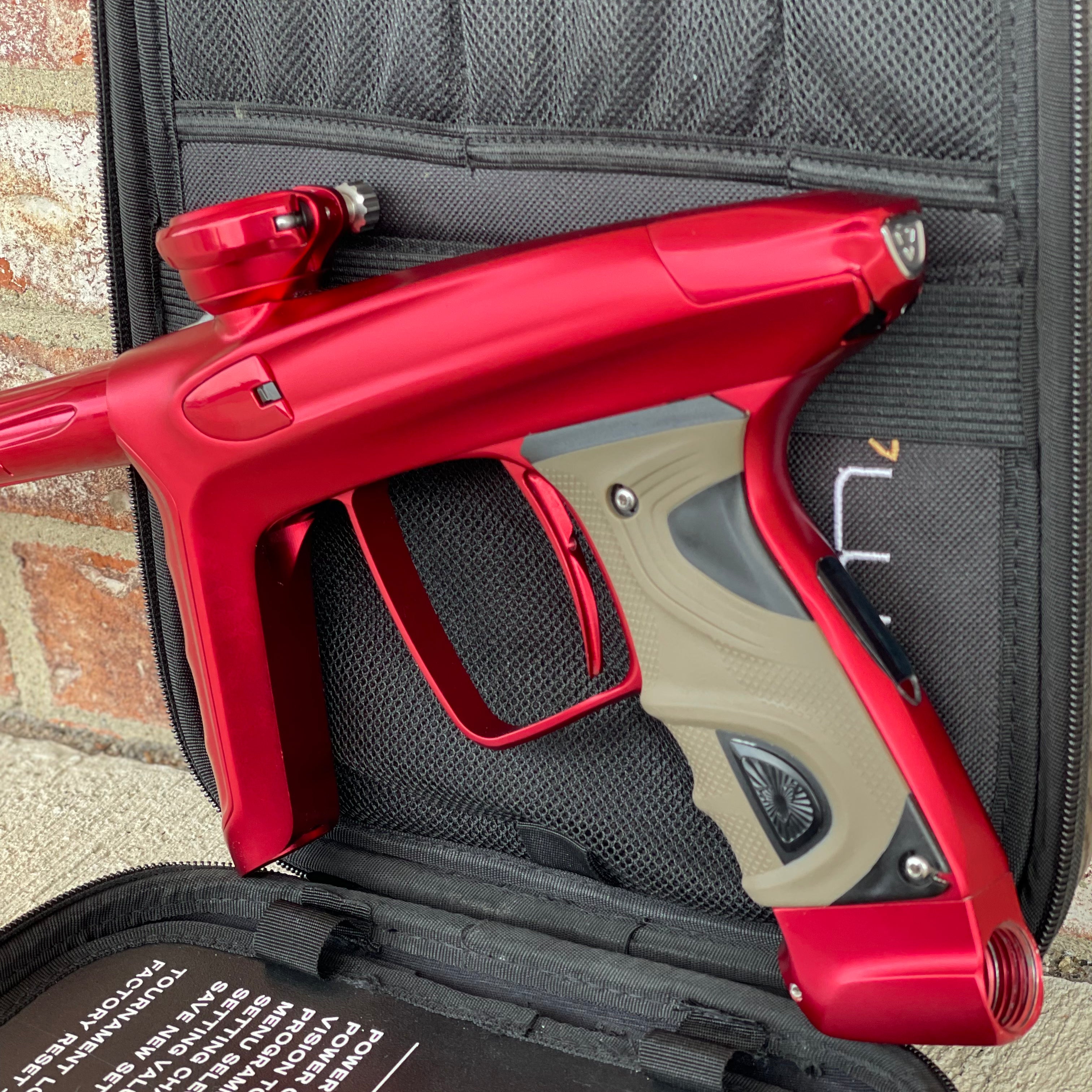 Used DLX Luxe TM40 Paintball Gun - Dust Red / Gloss Red w/ 2 back grips and SSC Soft Tip Bolt