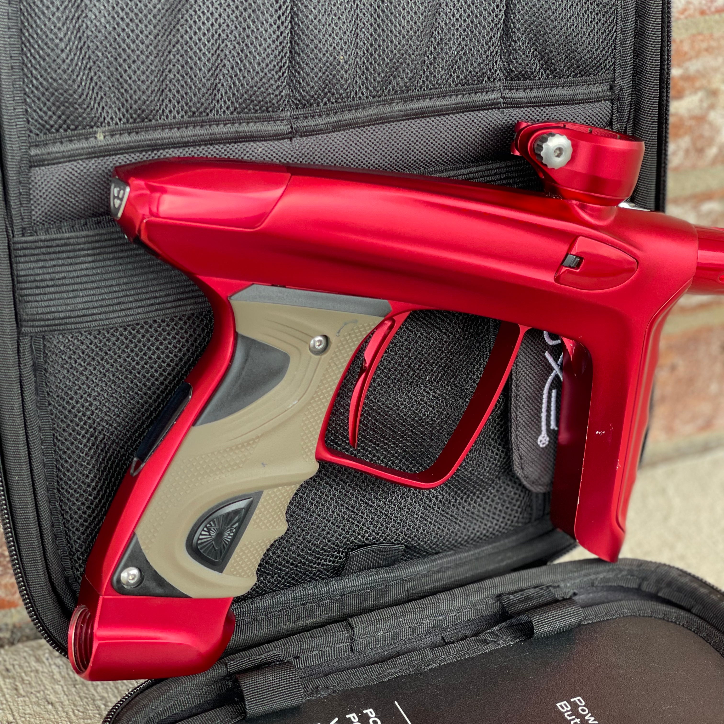 Used DLX Luxe TM40 Paintball Gun - Dust Red / Gloss Red w/ 2 back grips and SSC Soft Tip Bolt