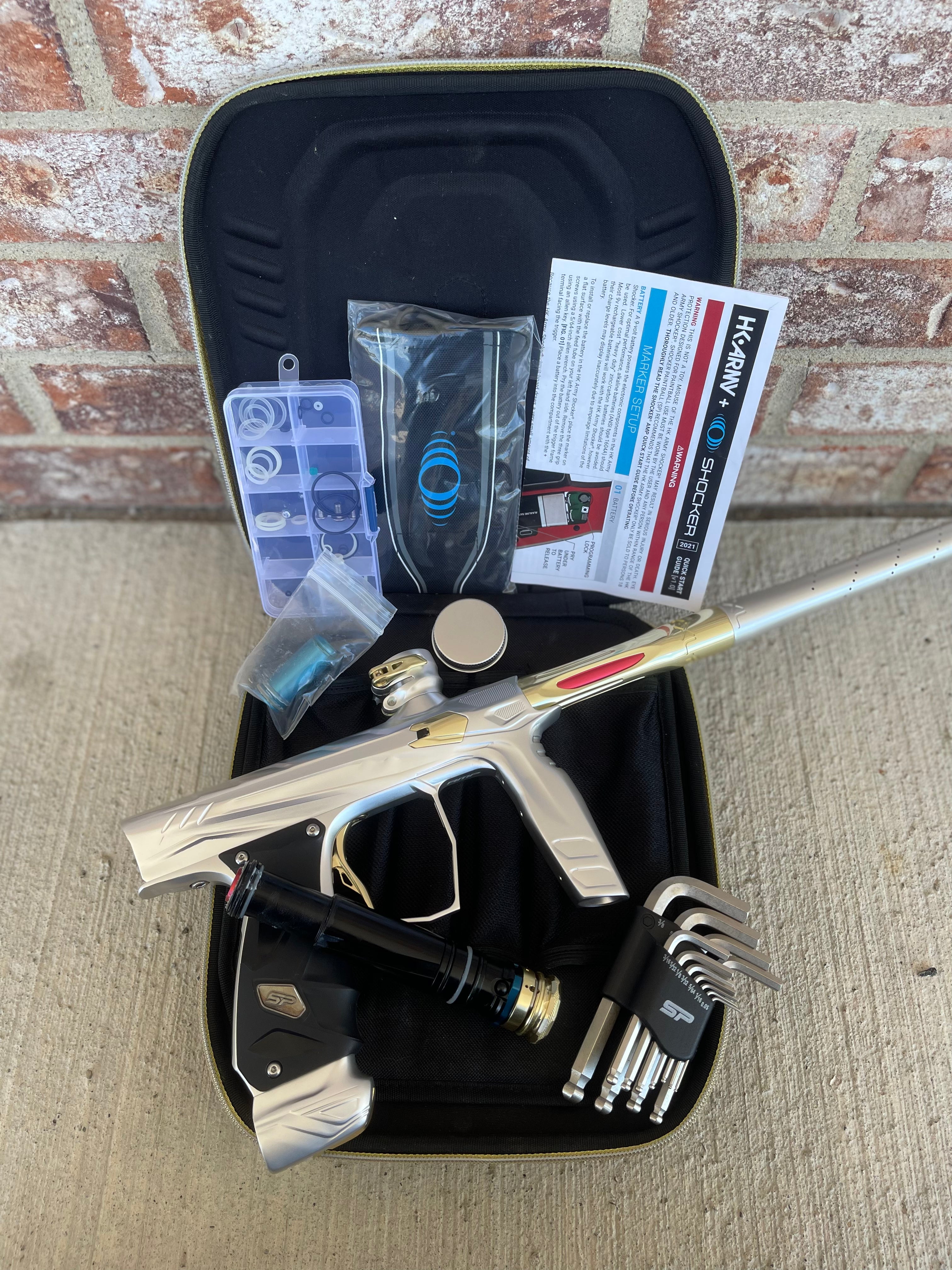 Used HK Army Shocker Amp Paintball Gun - Silver/ Gold
