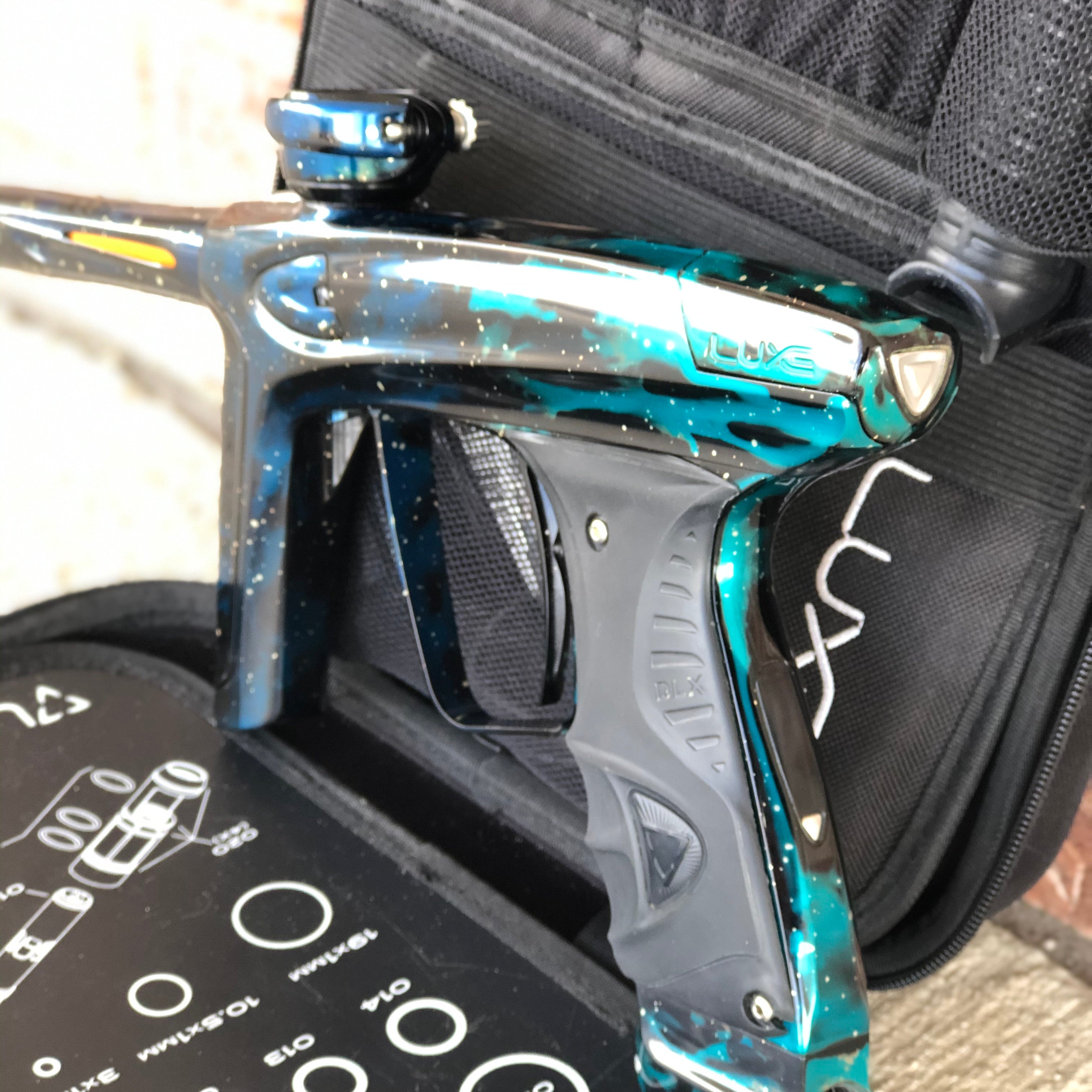 Used DLX Luxe Ice Paintball Gun - Galaxy Teal/Black/Blue