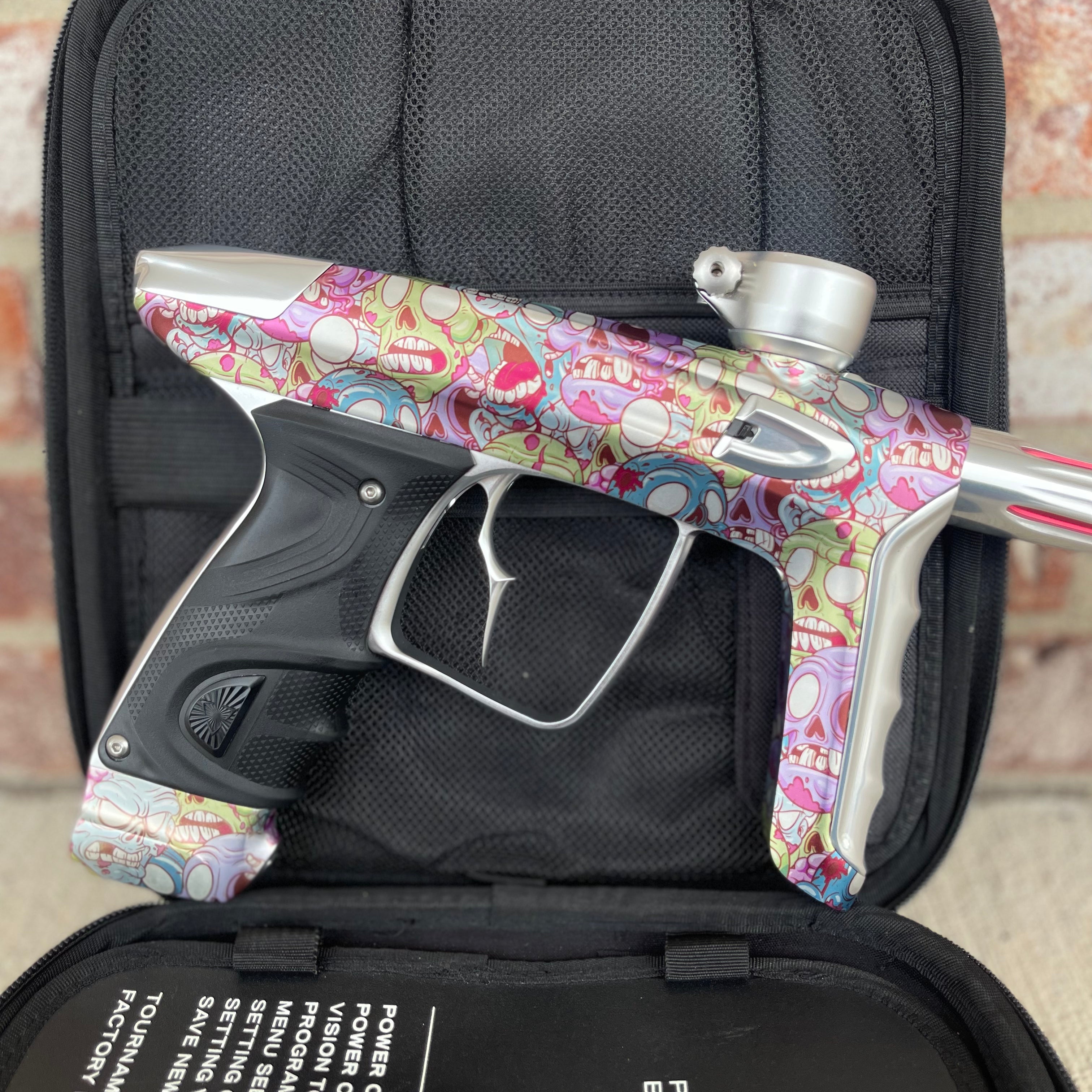 Used DLX Luxe TM40 Paintball Gun - LE Zombie Edition w/Silver Deuce Trigger & Wireless Charger