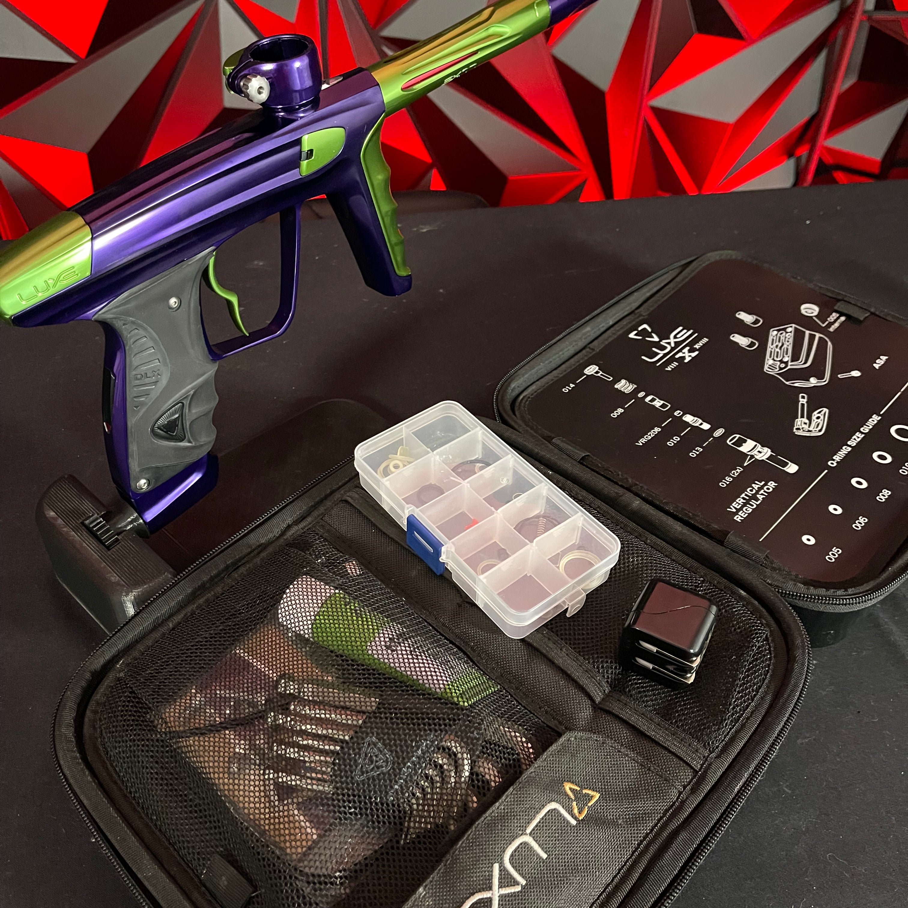 Used DLX Luxe X Paintball Gun - Gloss Purple / Gloss Lime w/ Deuce Trigger