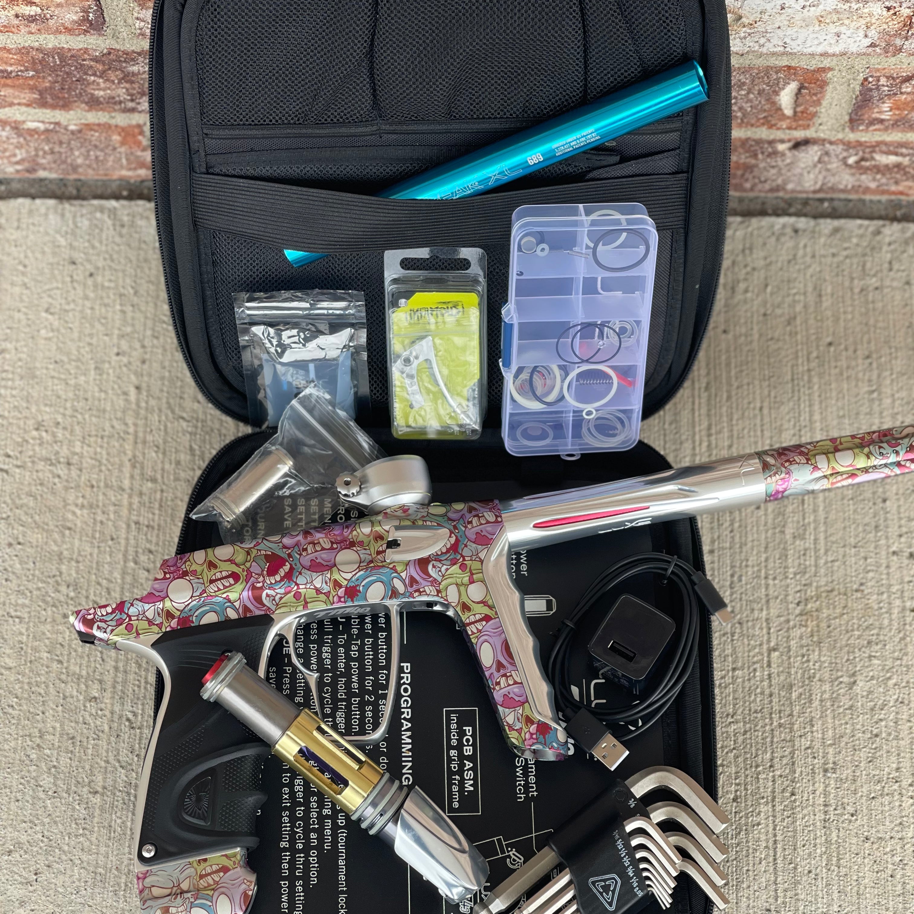 Used DLX Luxe TM40 Paintball Gun - LE Zombie Edition w/Silver Deuce Trigger & Wireless Charger