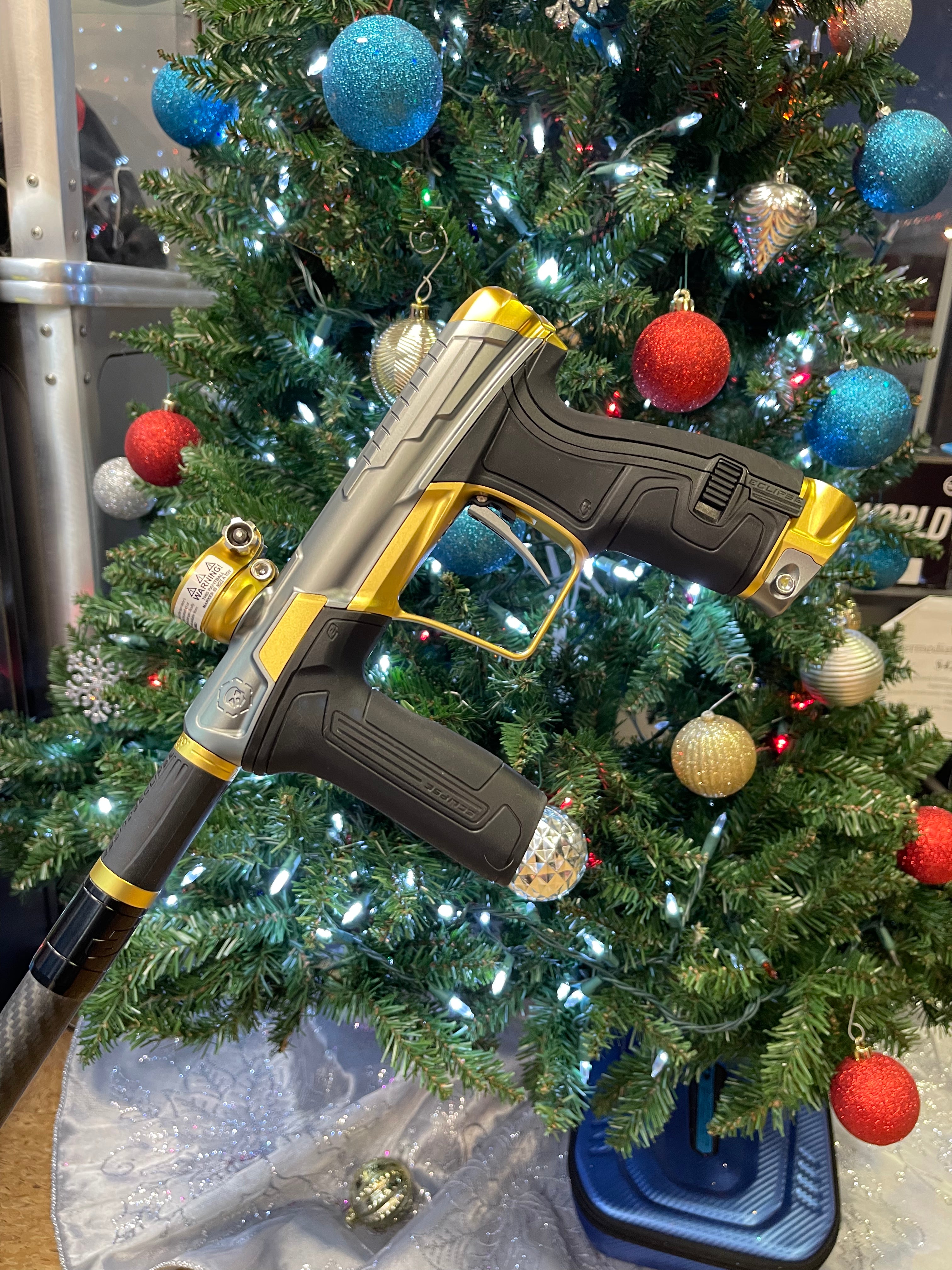 Used Infamous / Planet Eclipse CS2 Paintball Gun - Grey / Gold w/ 3 FL Inserts