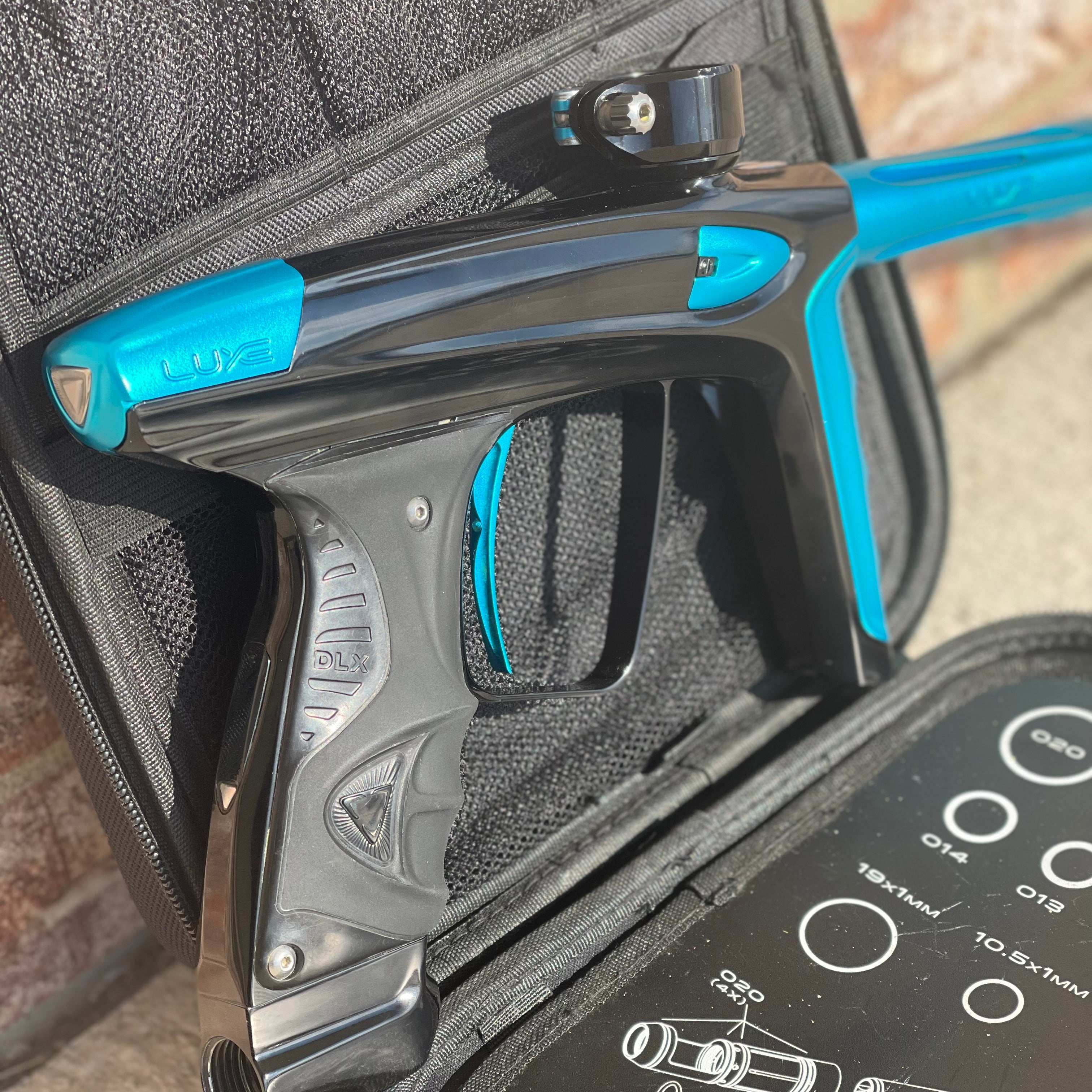 Used DLX Luxe Ice Paintball Gun - Polished Black / Dust Teal