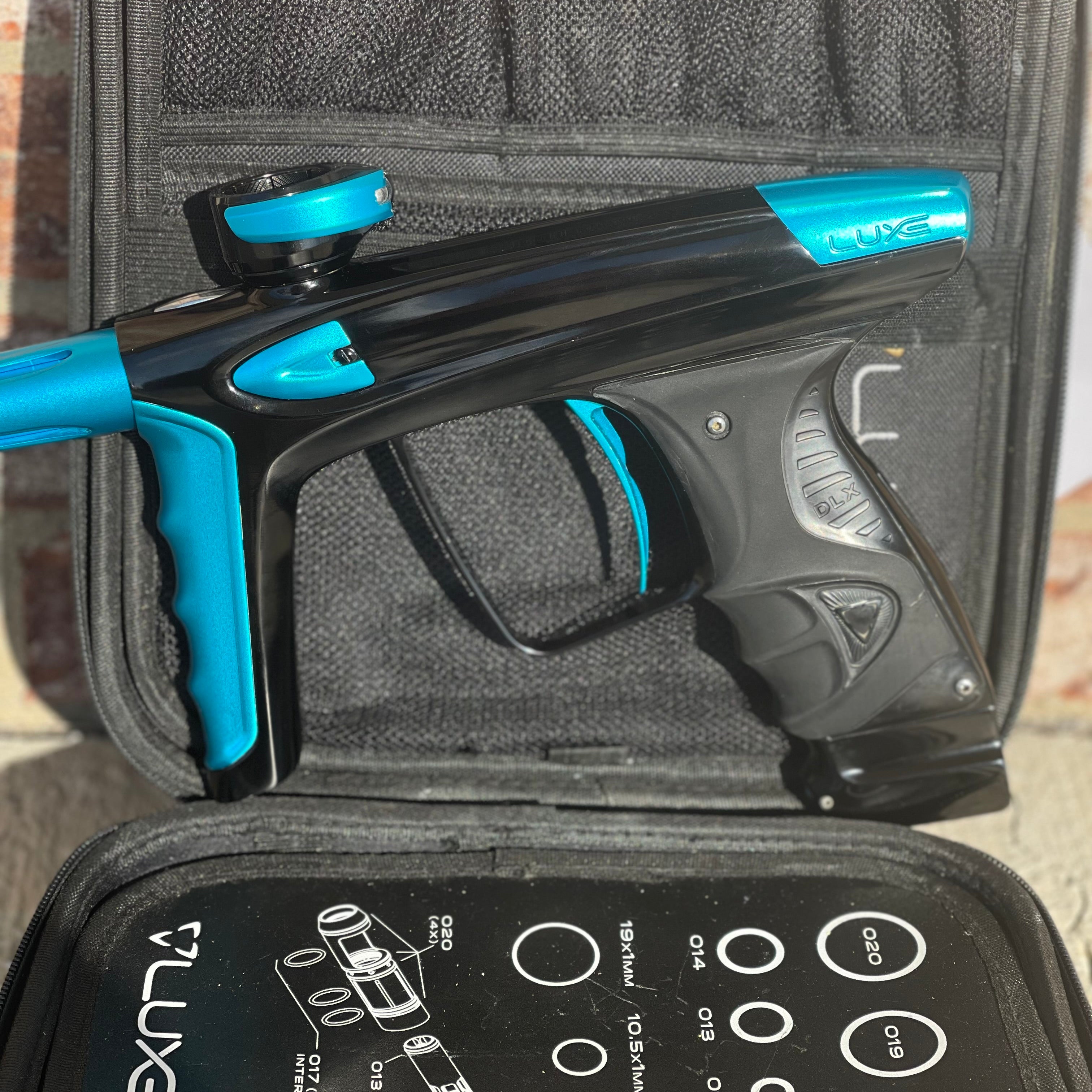 Used DLX Luxe Ice Paintball Gun - Polished Black / Dust Teal